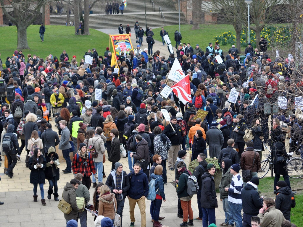 Students protesting sussex University outsourcing gather before the march