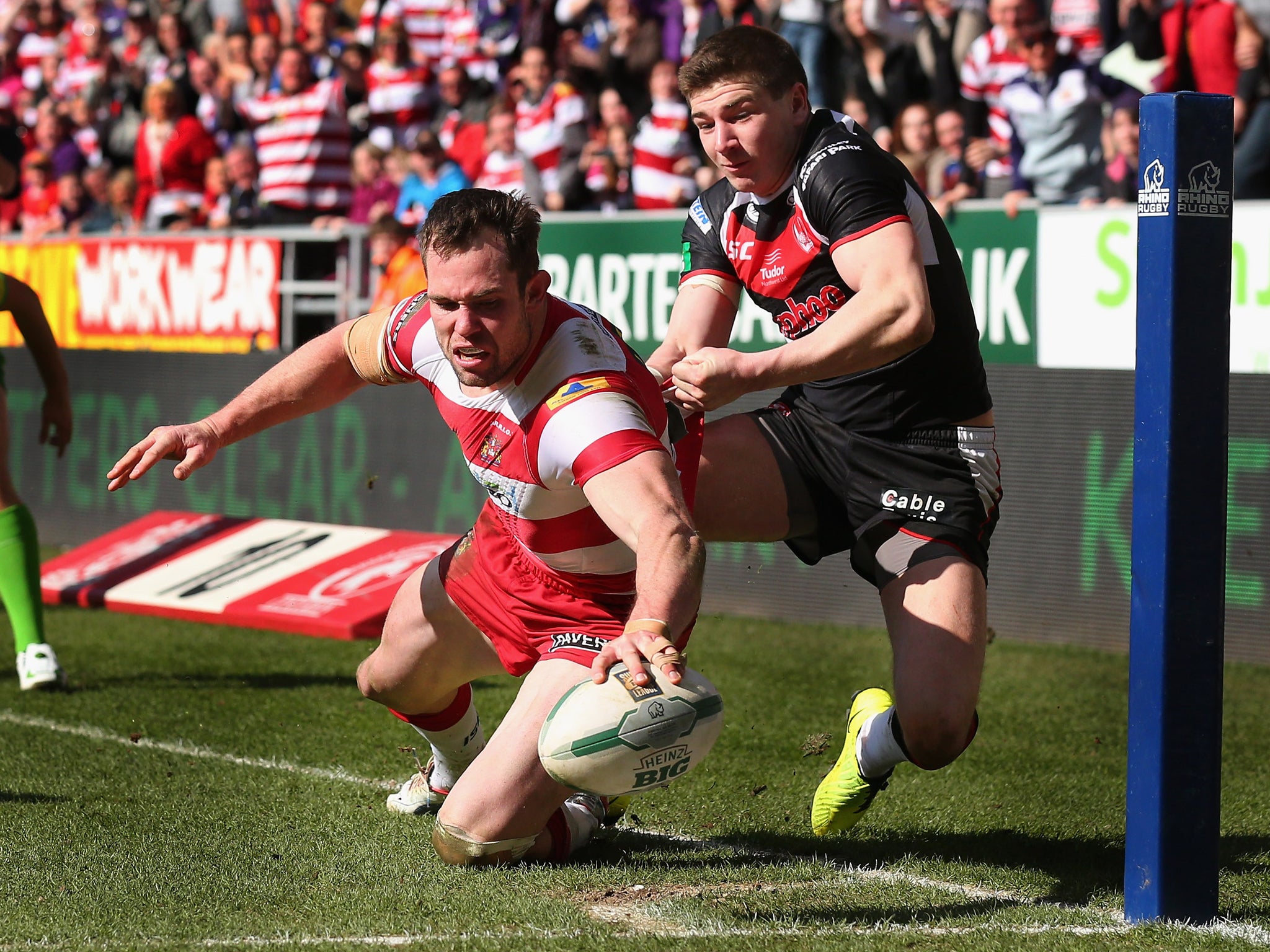 Pat Richards scores for Wigan in yesterday’s win over St Helens