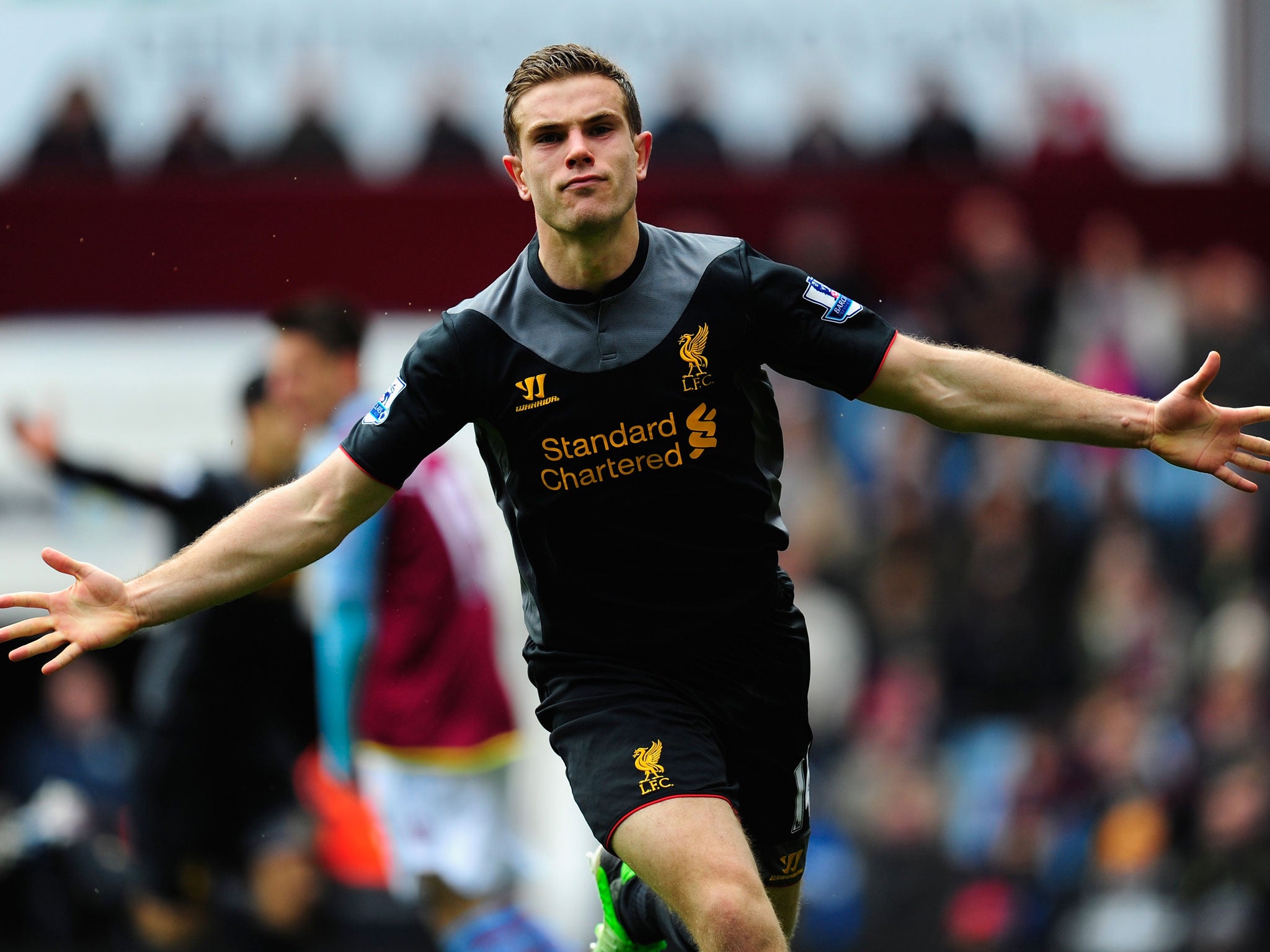 Liverpool Jordan Henderson celebrates after scoring the first Liverpool goal