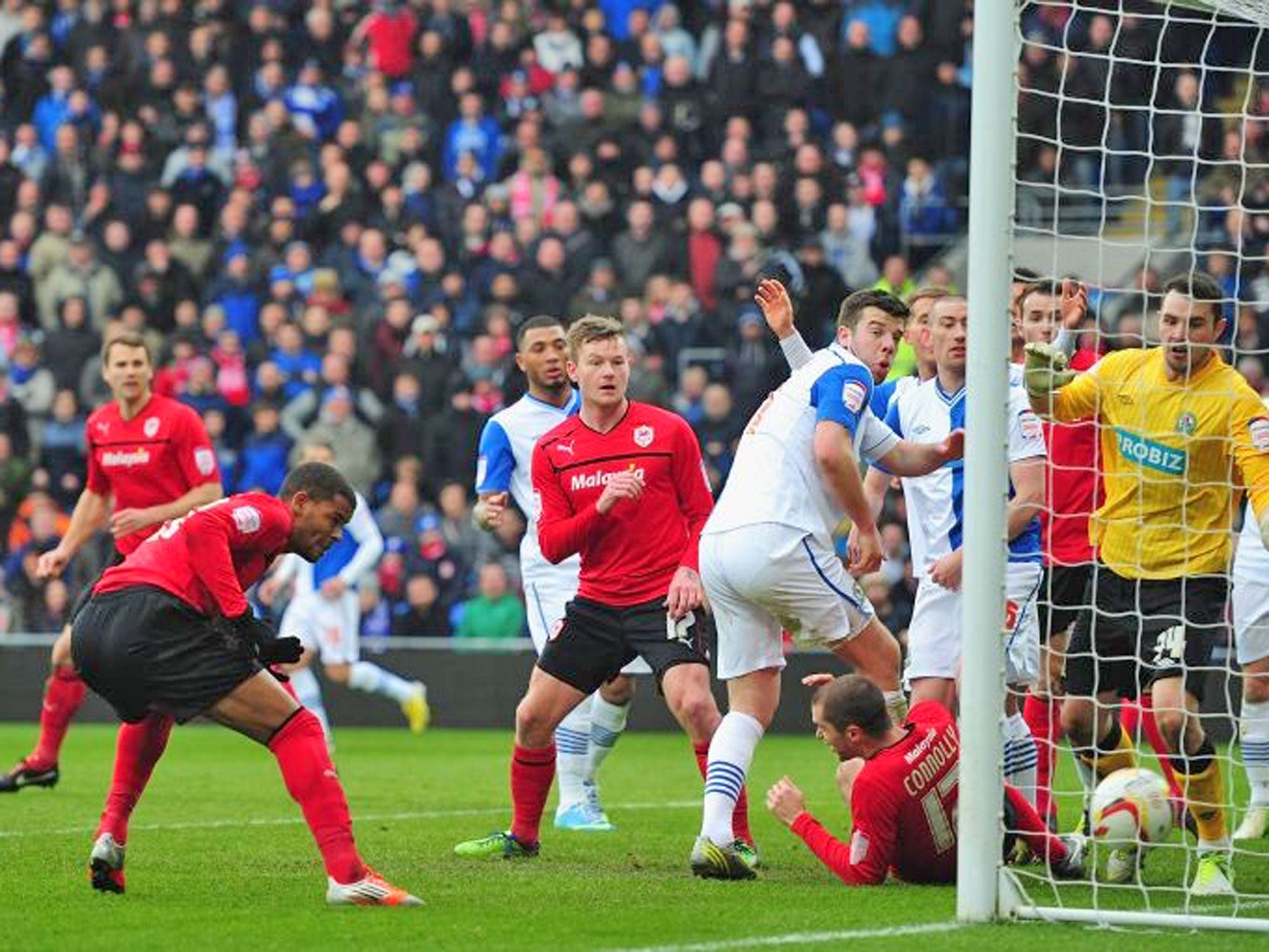 Cardiff City forward Fraizer Campbell (far left) heads home the opener in todays’s emphatic win