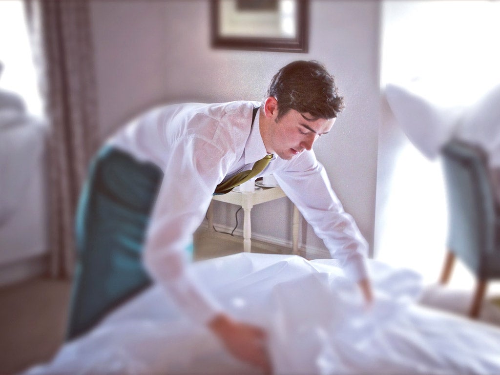 Room service: a student at Wivenhoe House learning on the job