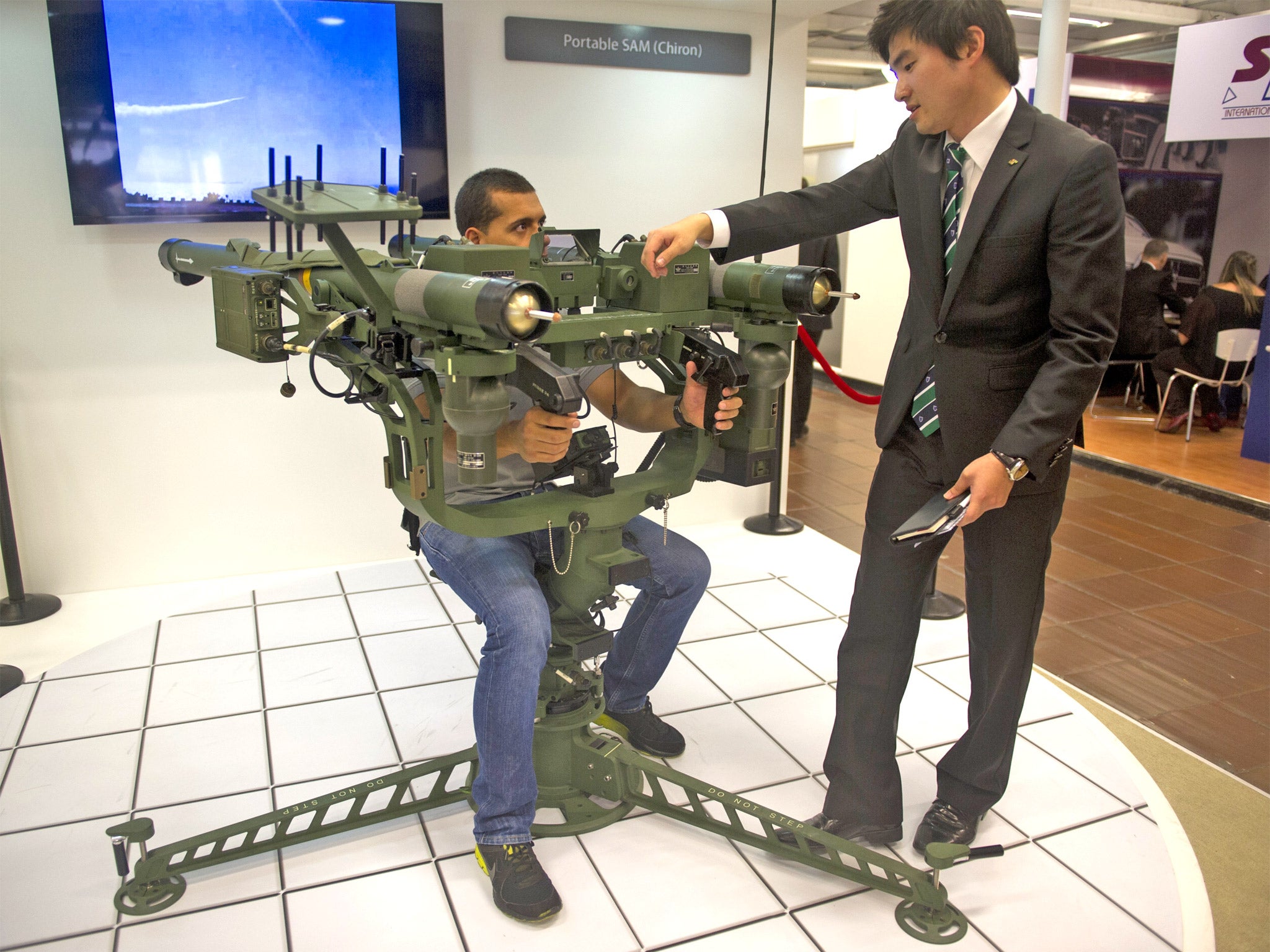 Weapons on sale at a defence fair in Bogota, Colombia