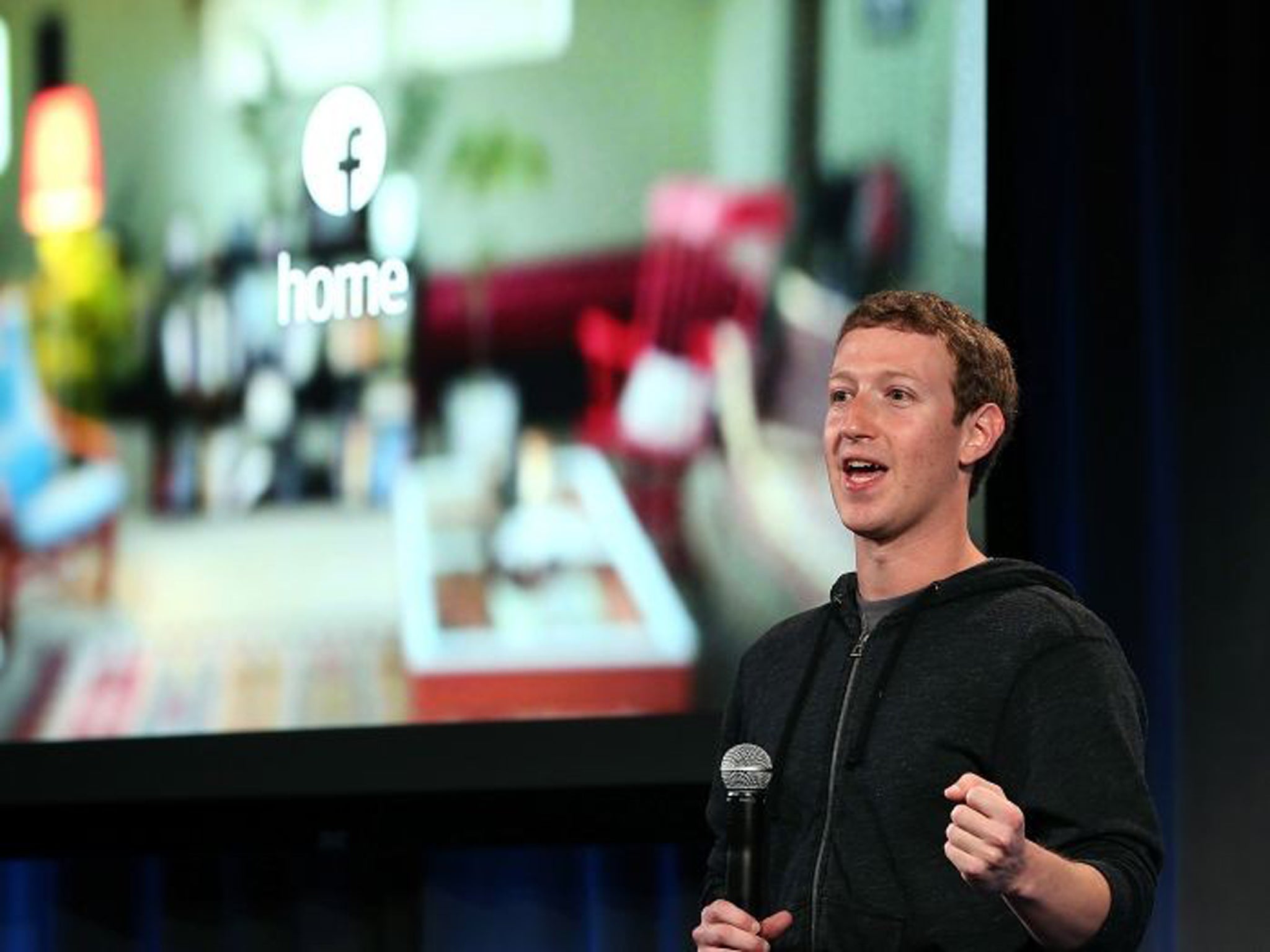 Mark Zuckerberg unveils the new software –Facebook Home –in California