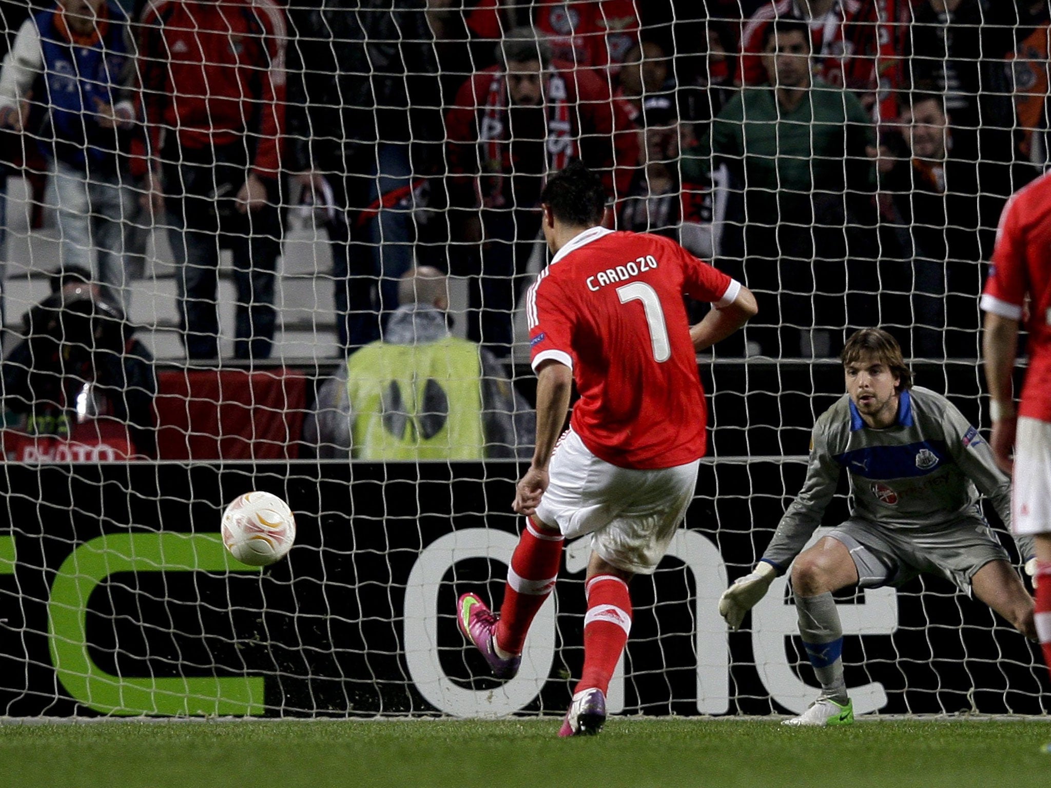 Oscar Cardozo scores a penalty during the game against Newcastle