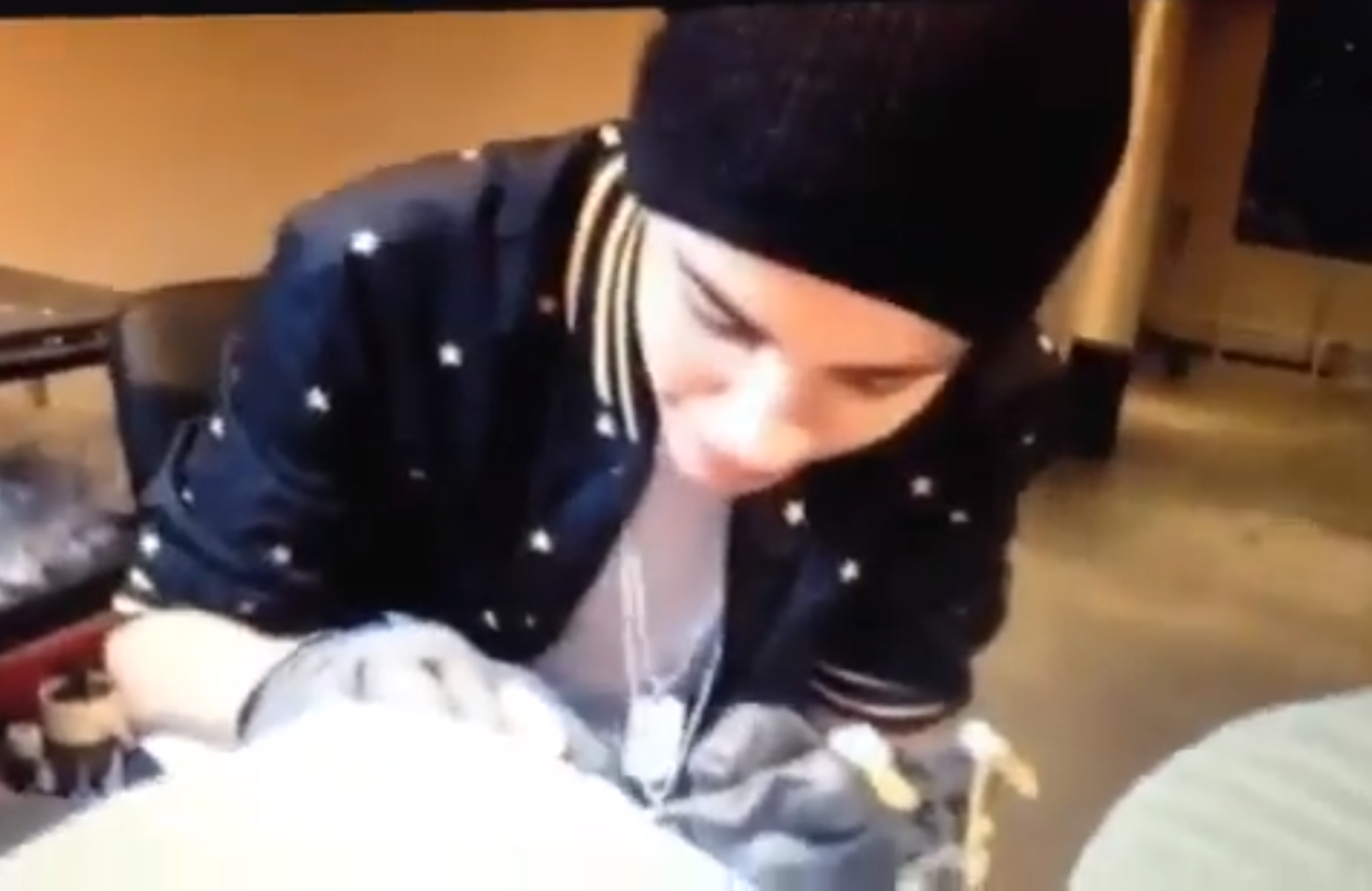 Justin Bieber tattooing Bang Bang's leg