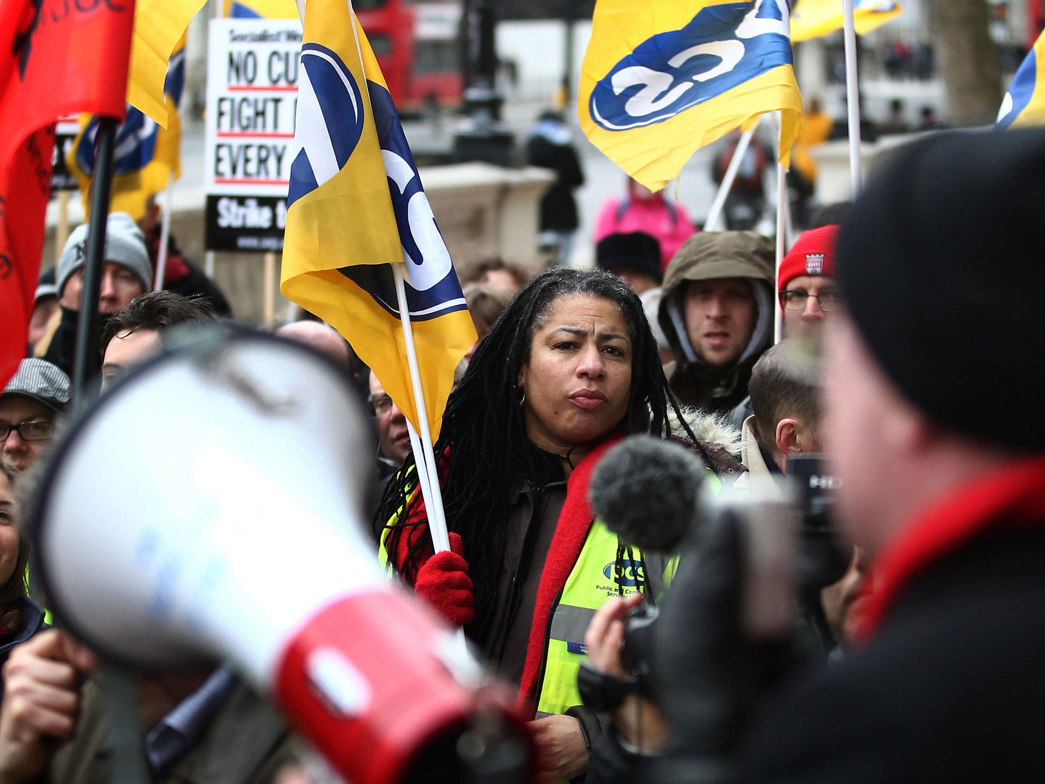 Members of the Public and Commercial Services Union prepare for a strike outside the Cabinet Office in Whitehall, London