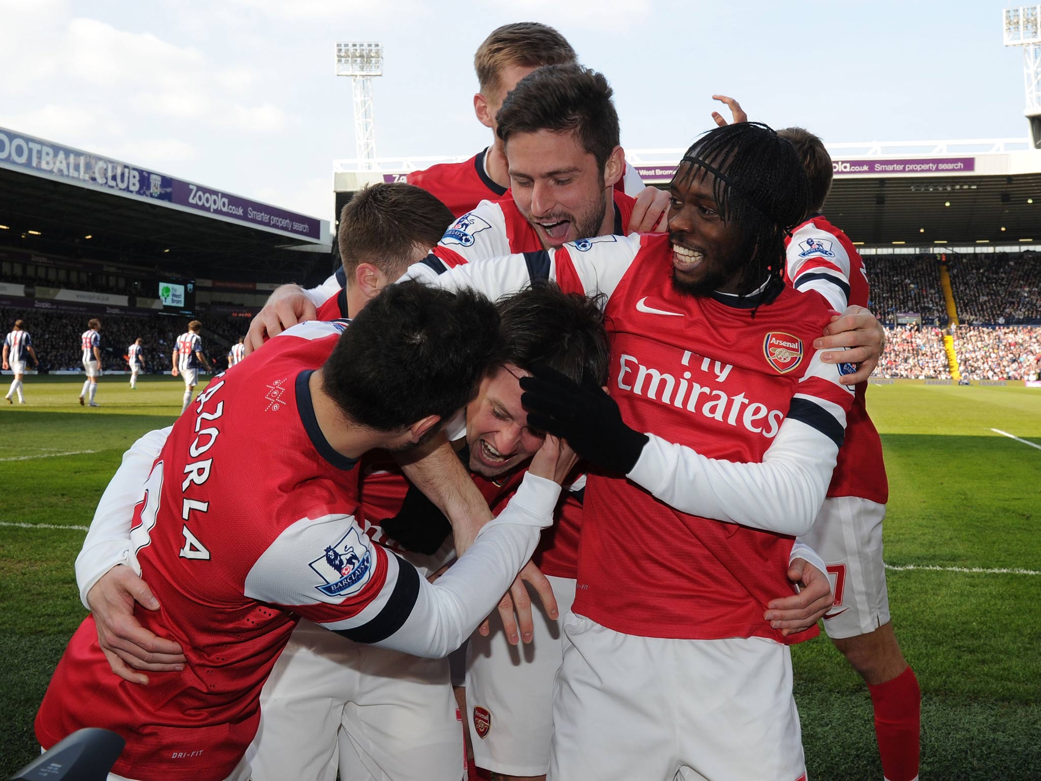 Tomas Rosicky celebrates scoring against West Brom with Arsenal team-mates Santi Cazorla, Aaron Ramsey, Per Mertesacker, Olivier Giroud and Gervinho