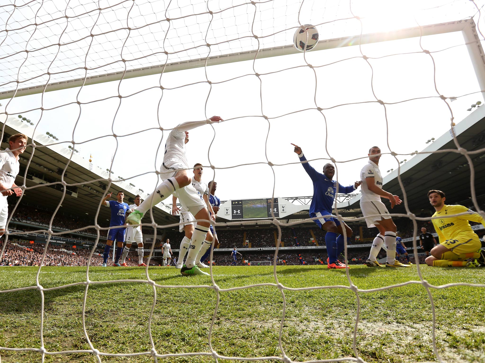 Victor Anichebe of Everton celebrates as Phil Jagielka of Everton (not pictured) scores their first goal against Tottenham