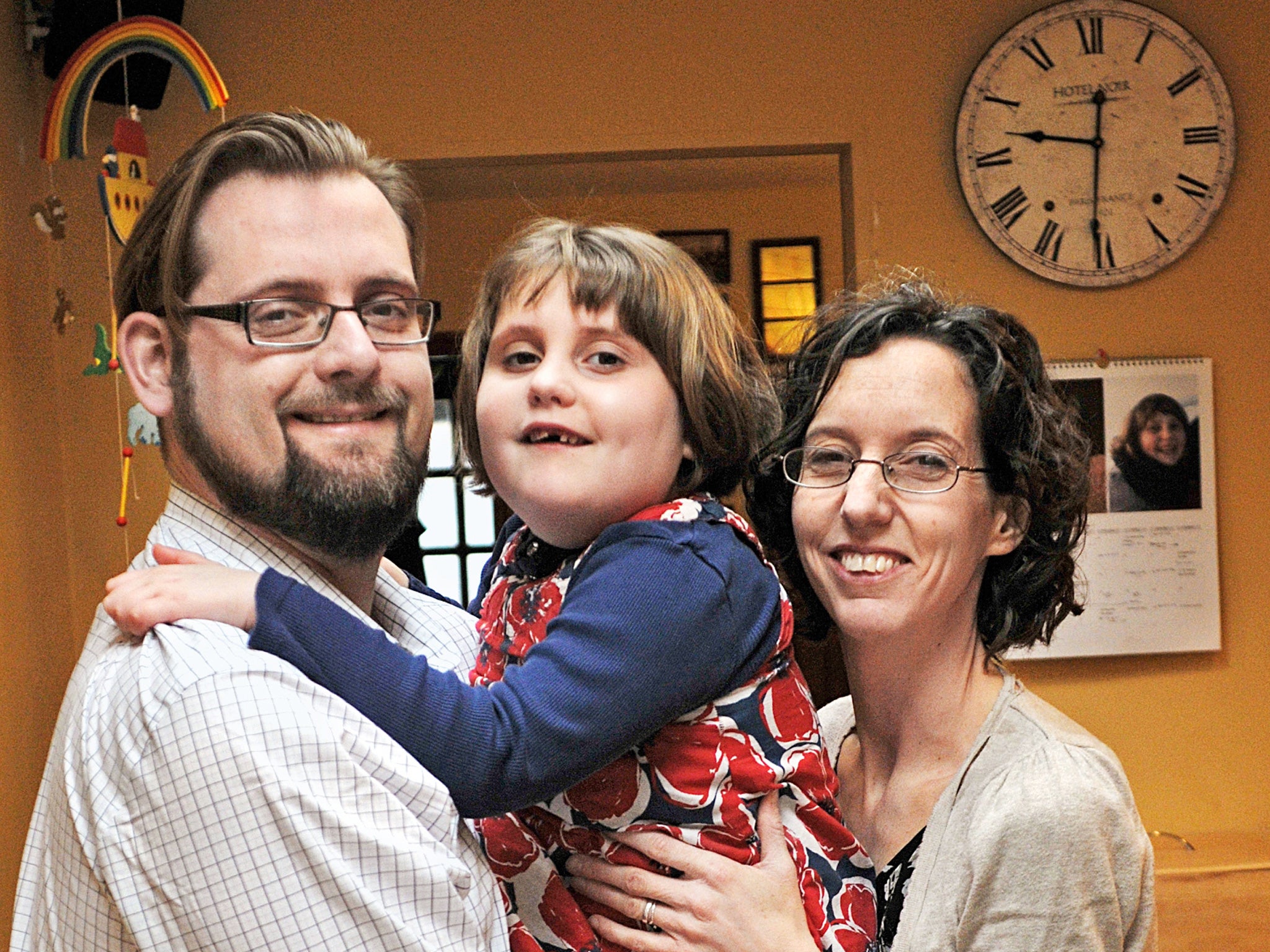 Growing pains: Hannah with her parents, Vincent and Beth Johnsson