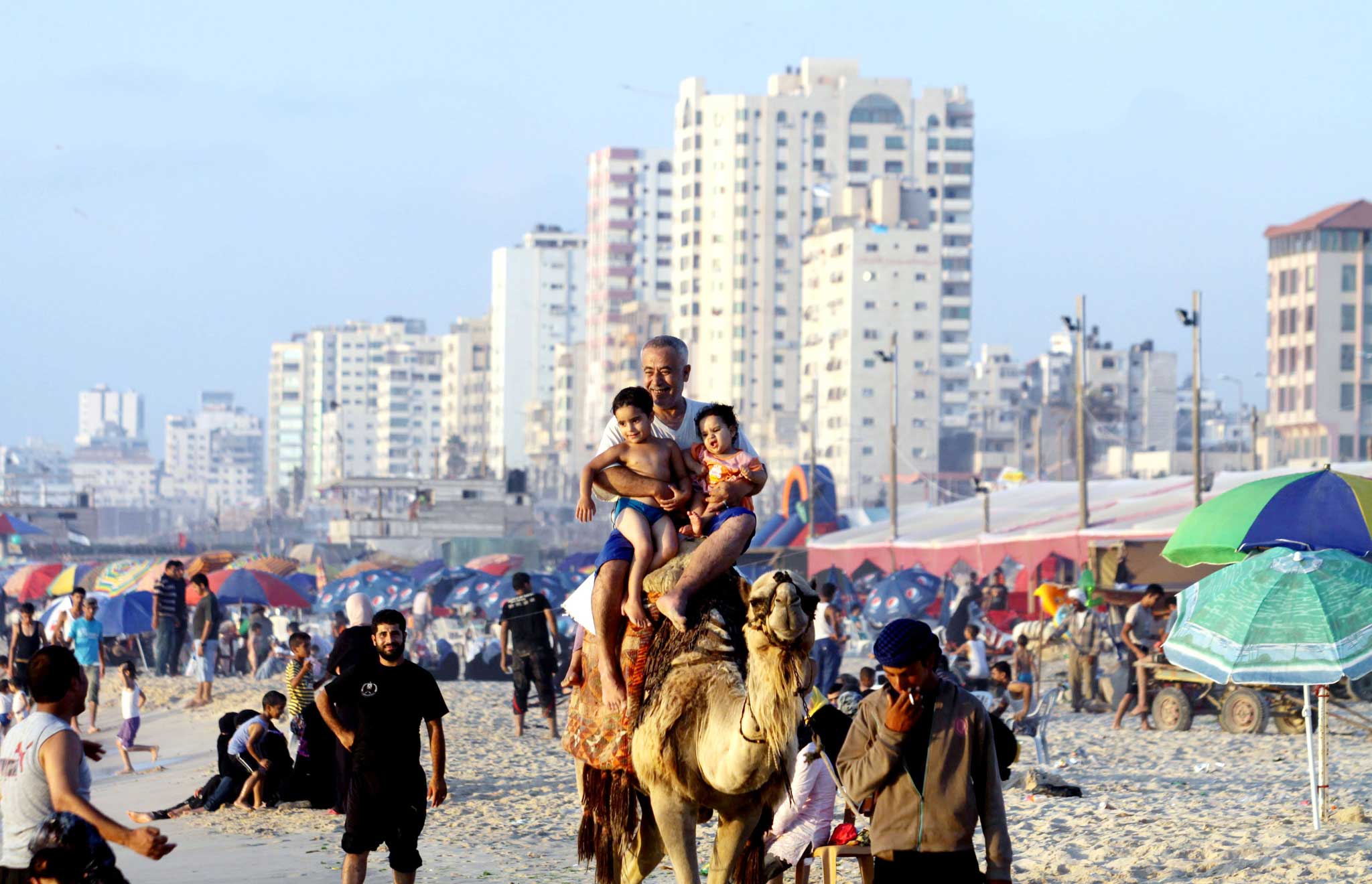 Palestinians in holiday mood in Gaza last year. But life for them since Israel's sanctions is increasingly difficult