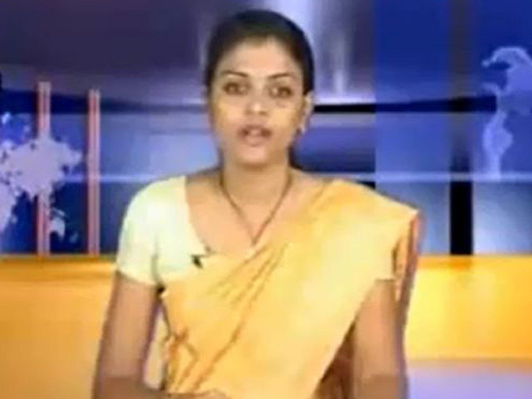 Rathimohan Lokini presents a Tamil Tiger news broadcast