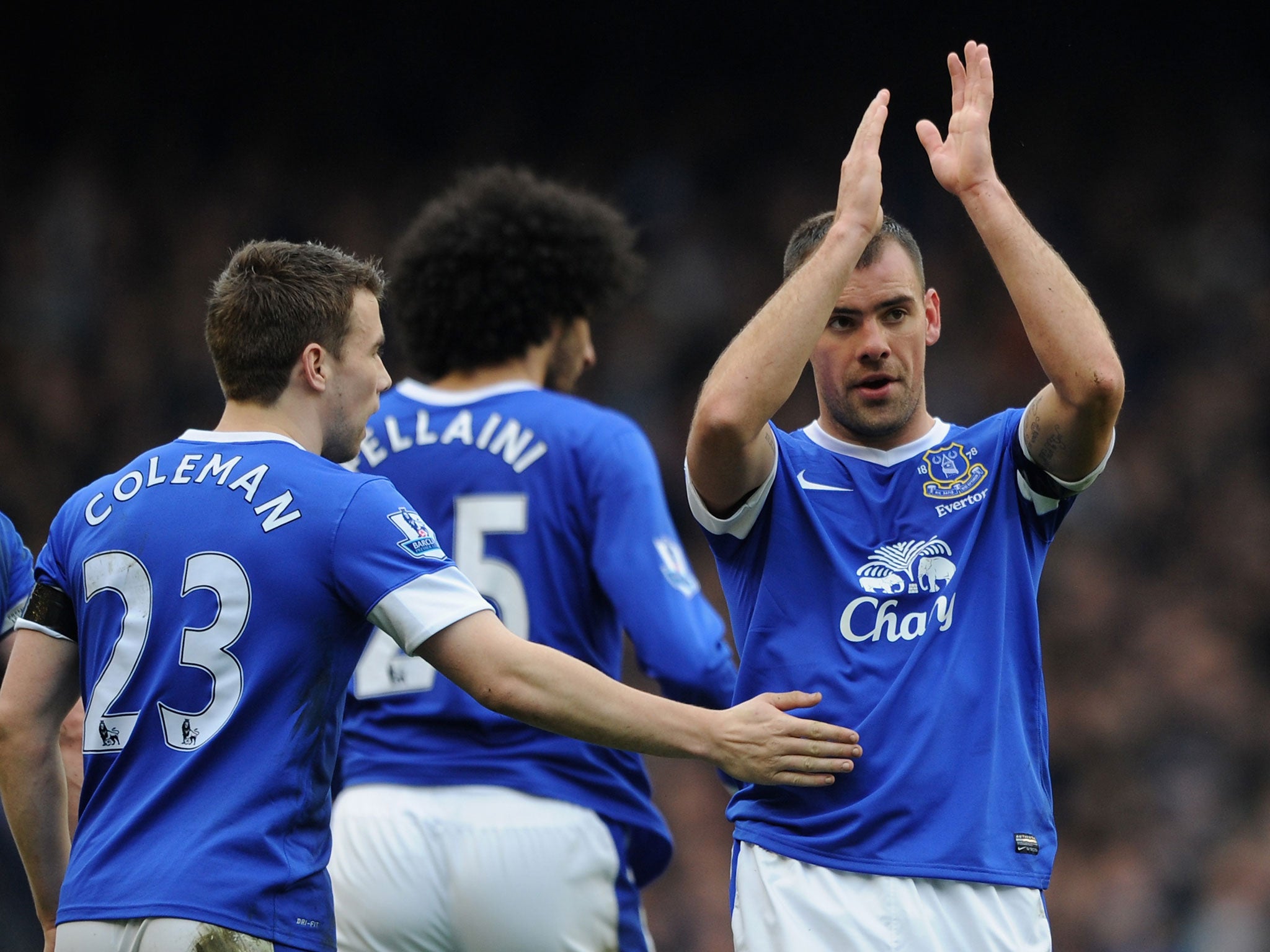 Darron Gibson of Everton is congratulated by his team-mate Seamus Coleman after scoring the opening goal