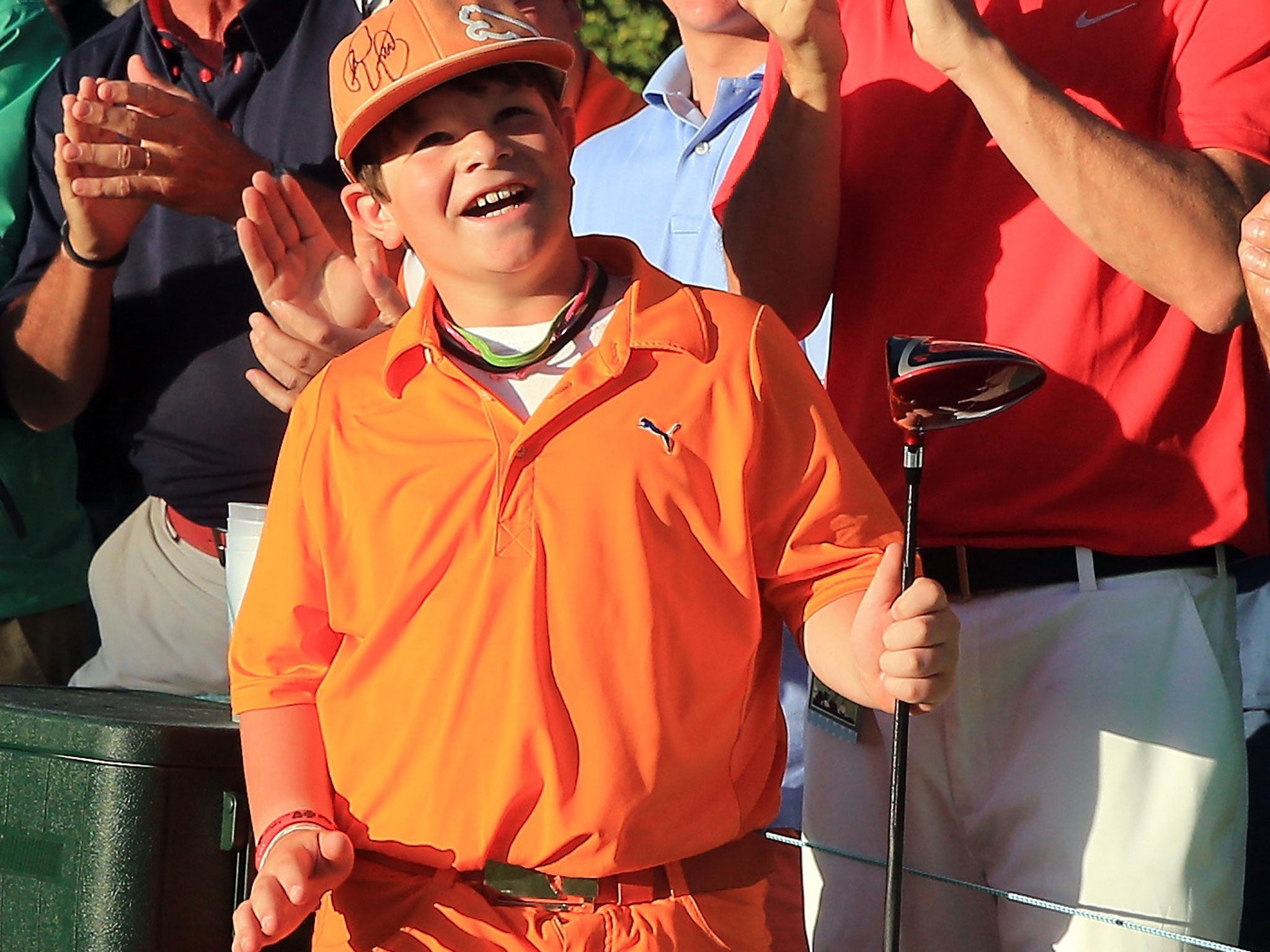 Youth club: This young fan is a happy recipient of Poulter’s driver