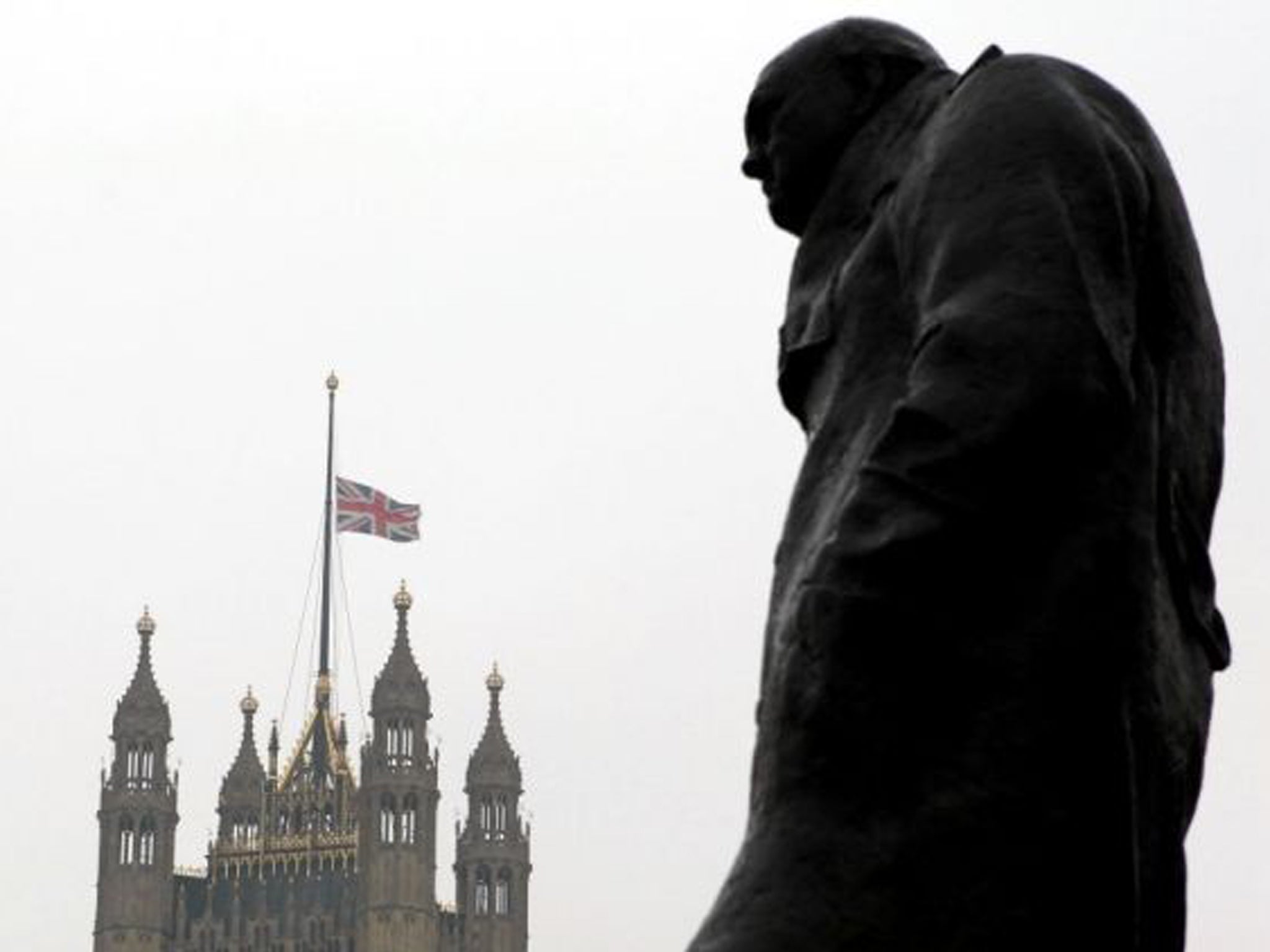 The statue of Winston Churchill in front of the Houses of Parliament as the Union flag flew at half mast after Baroness Thatcher's death. The bells of Big Ben and the Great Clock at Westminster will be silenced during her funeral for the first time since