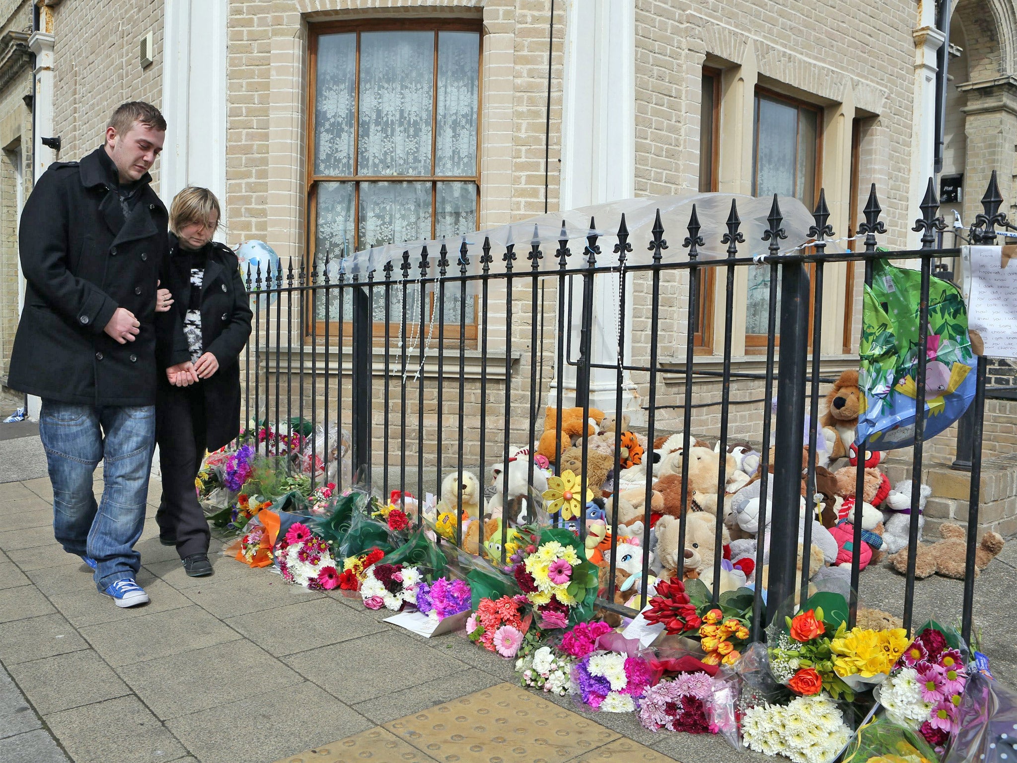 Craig McLelland with his mother outside Fiona Anderson's flat in London Road, Lowestoft