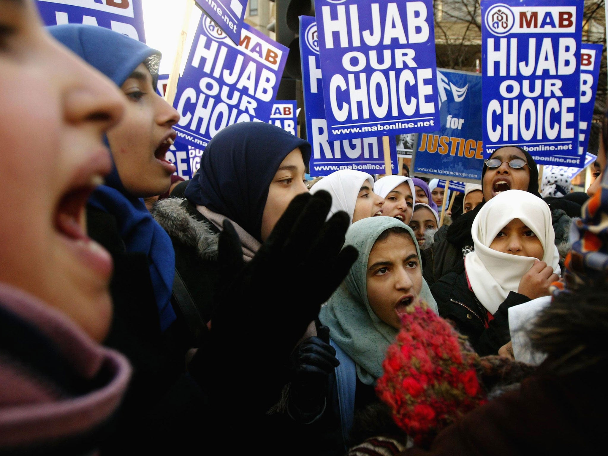 A group of Muslim women demonstrate outside the French Embassy on January 17, 2003 in London.