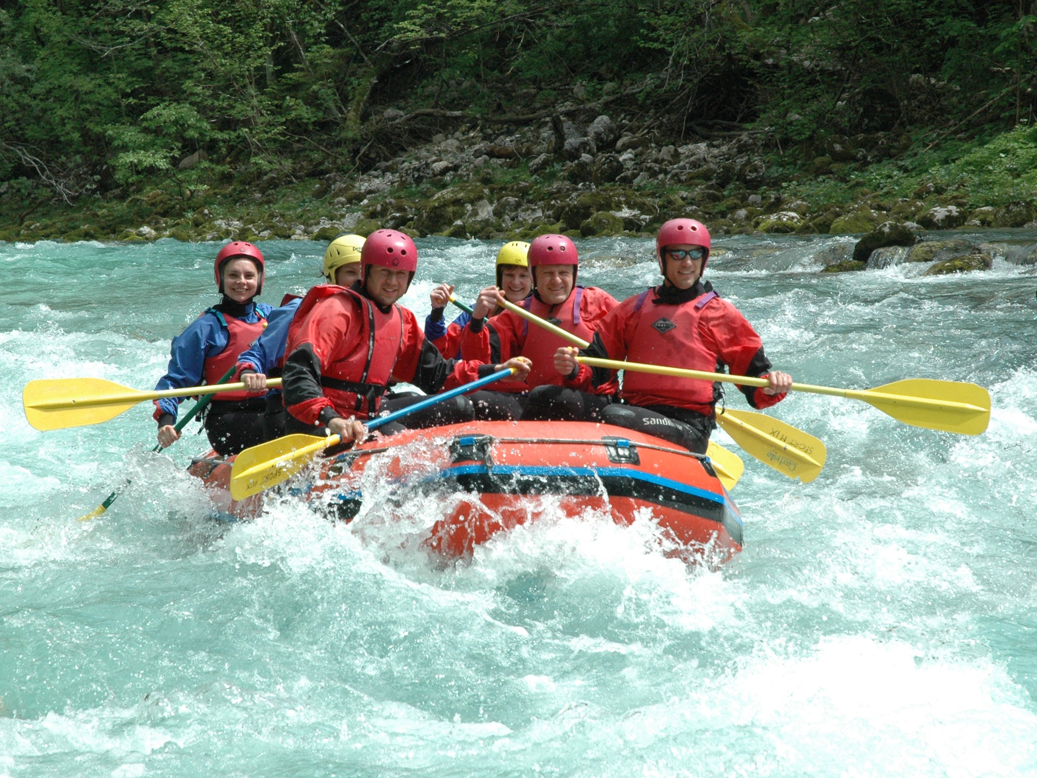 Paddle steam: Mark (second right) and crewmates take on the white waters