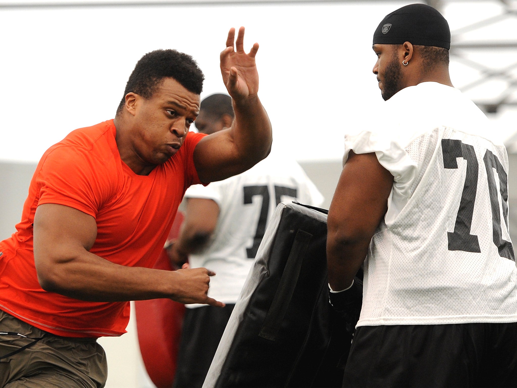 Lawrence Okoye takes part in activities during the NFL Media Day at the London Soccerdome on Tuesday