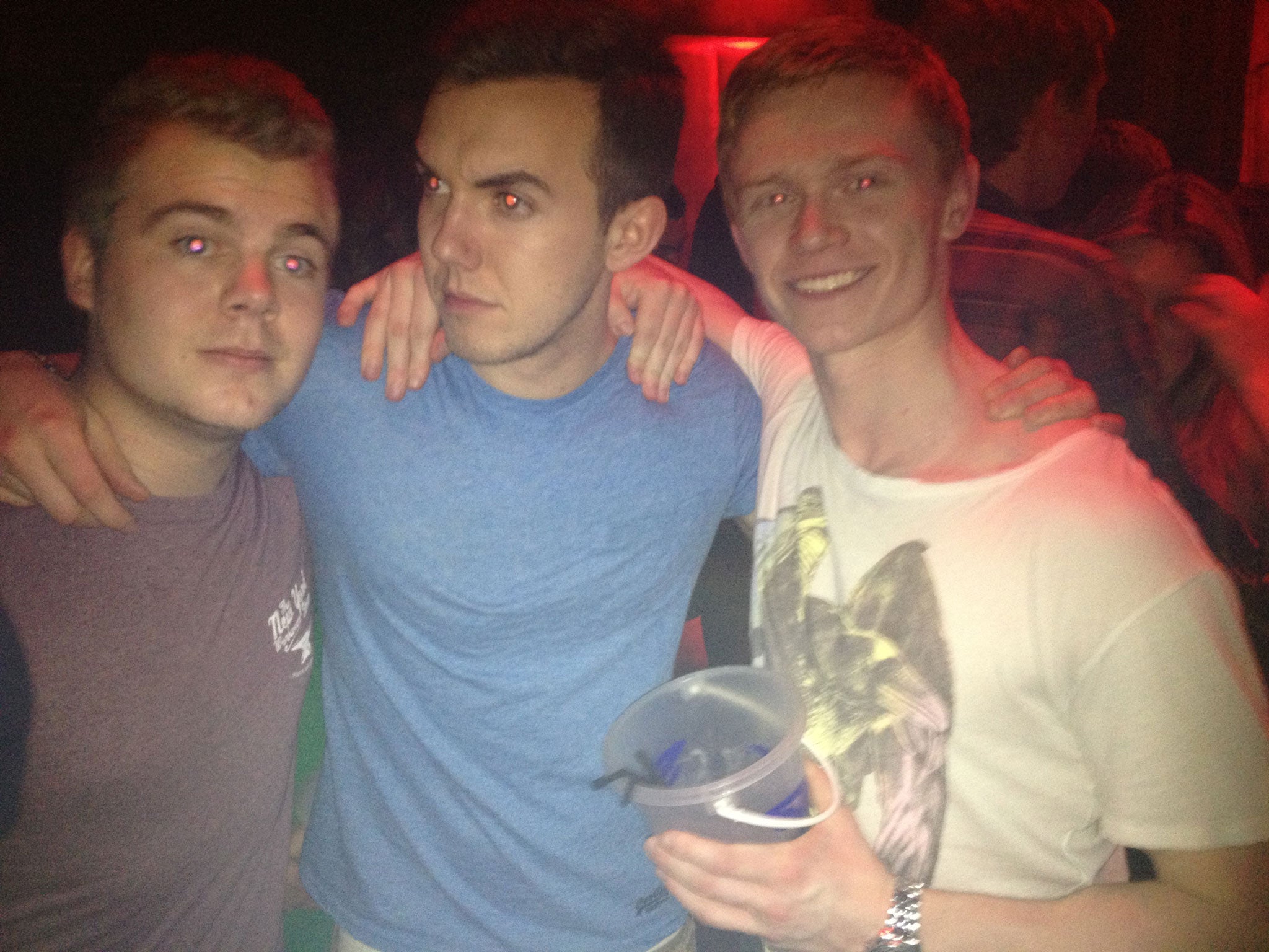 Paul, right, and friends, with his 'Jäger Shark bucket' at a student bar in Oxford