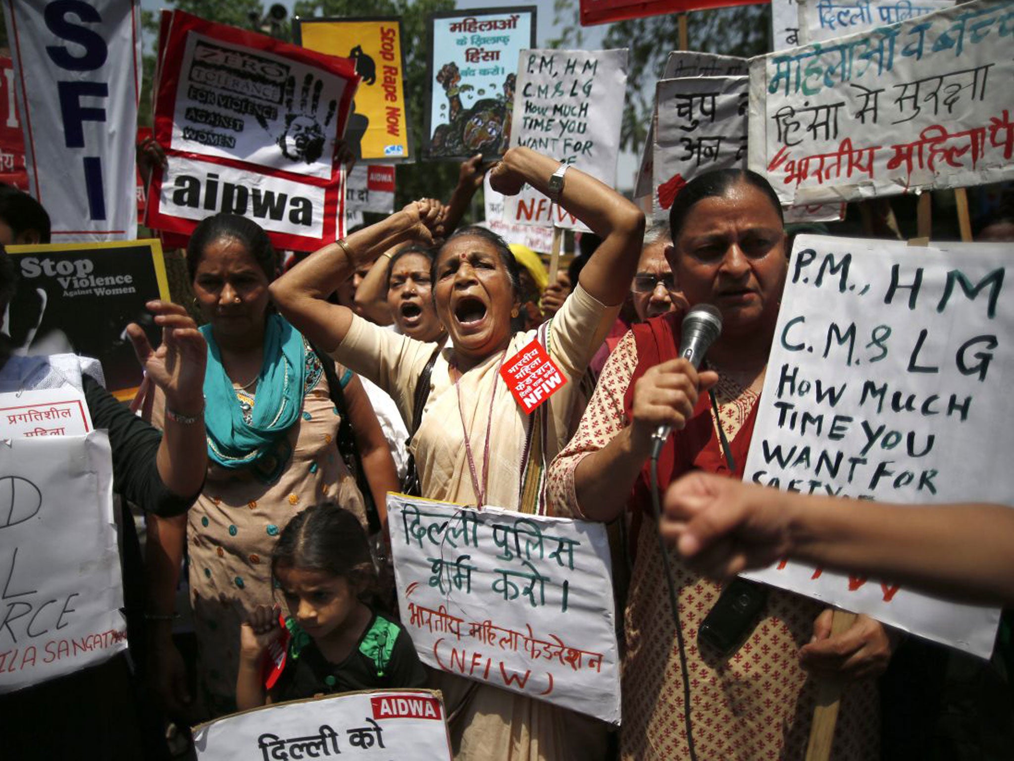 Indian women protest against how Indian authorities handle sex crimes near the Parliament in New Delhi, India