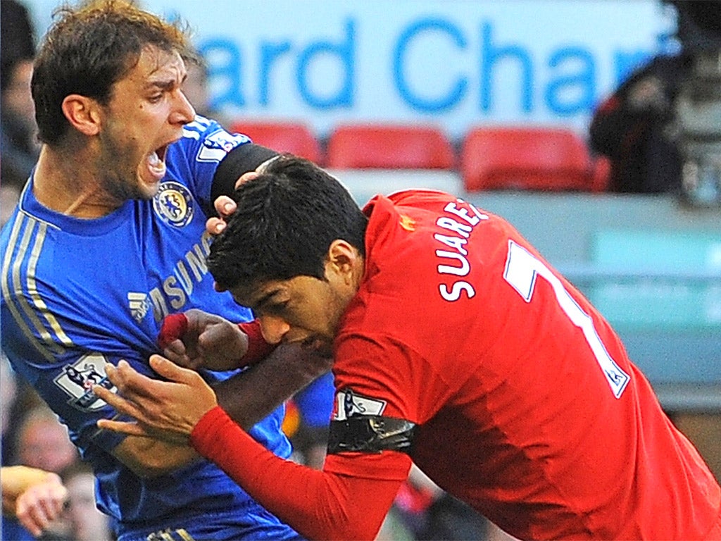 Suarez bit the arm of Chelsea defender Branislav Ivanovic