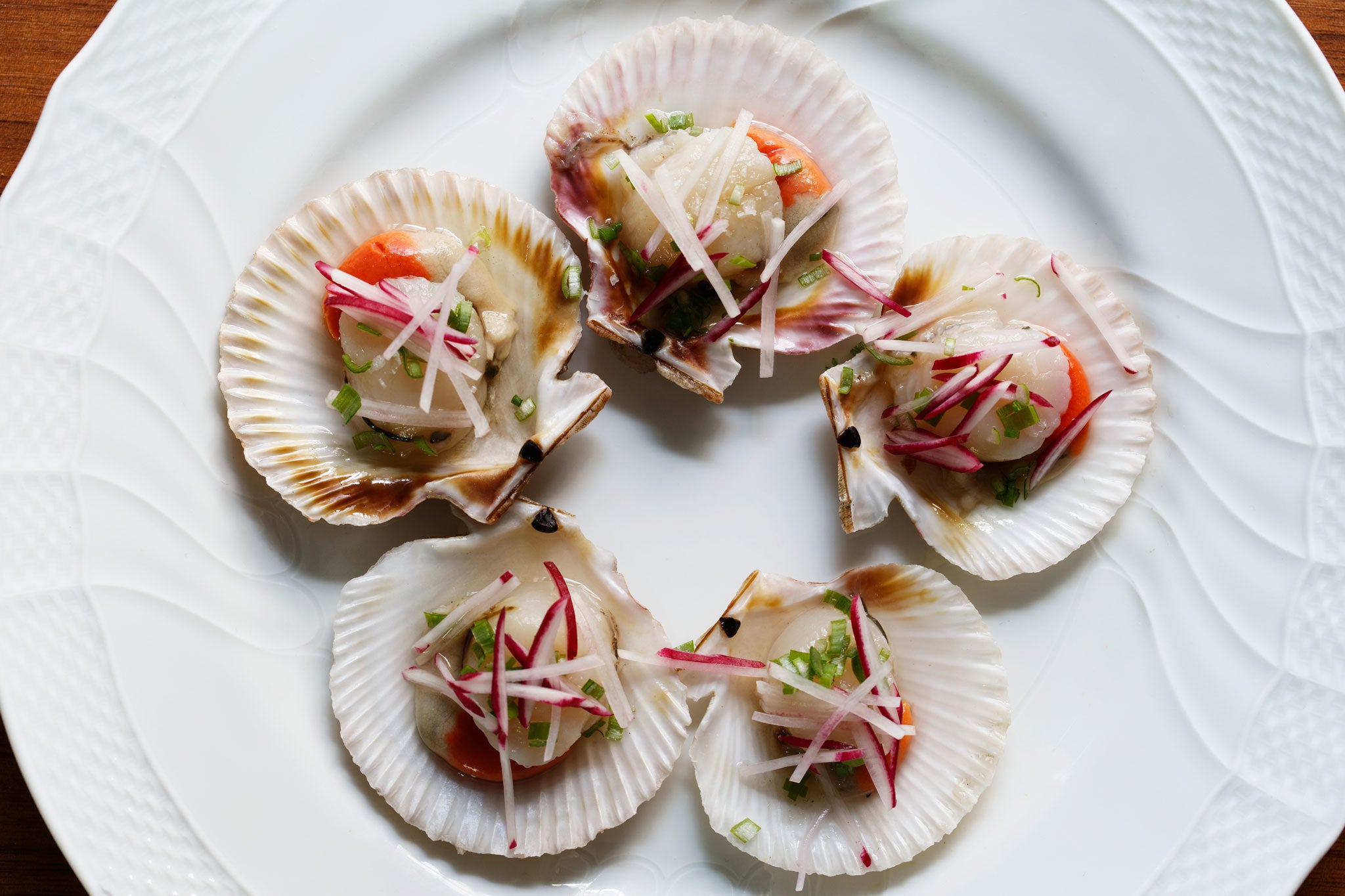 Queenies with radishes and ponzu