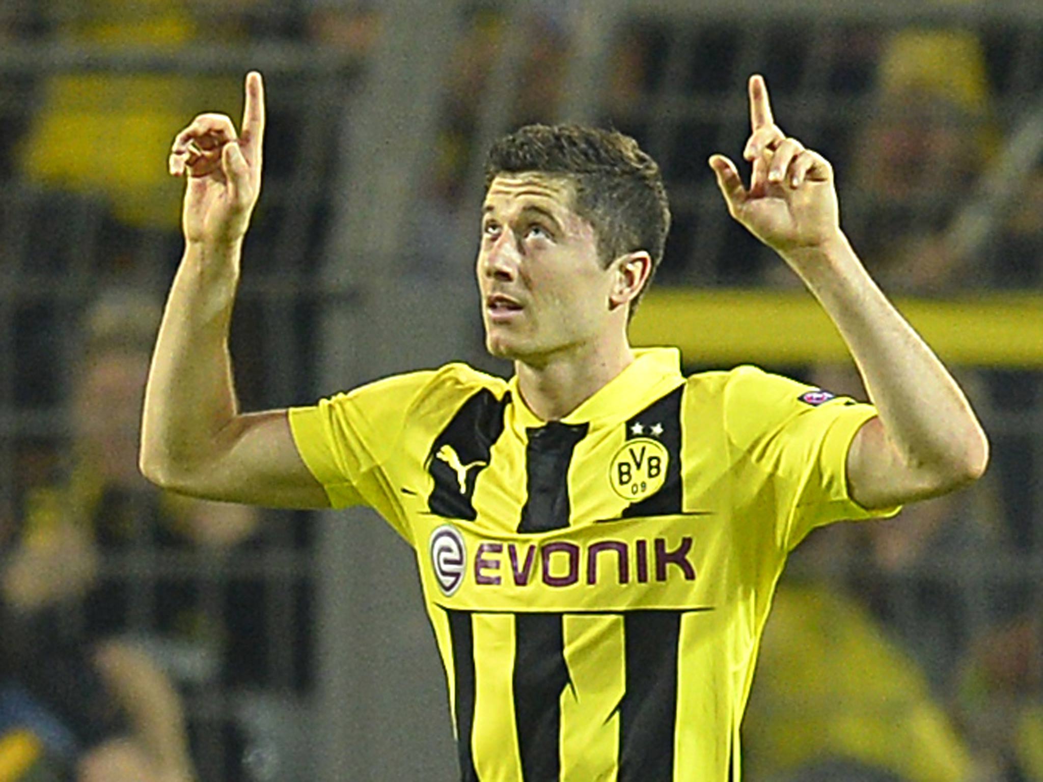 Robert Lewandowski celebrates as he scores four goals against Real Madrid