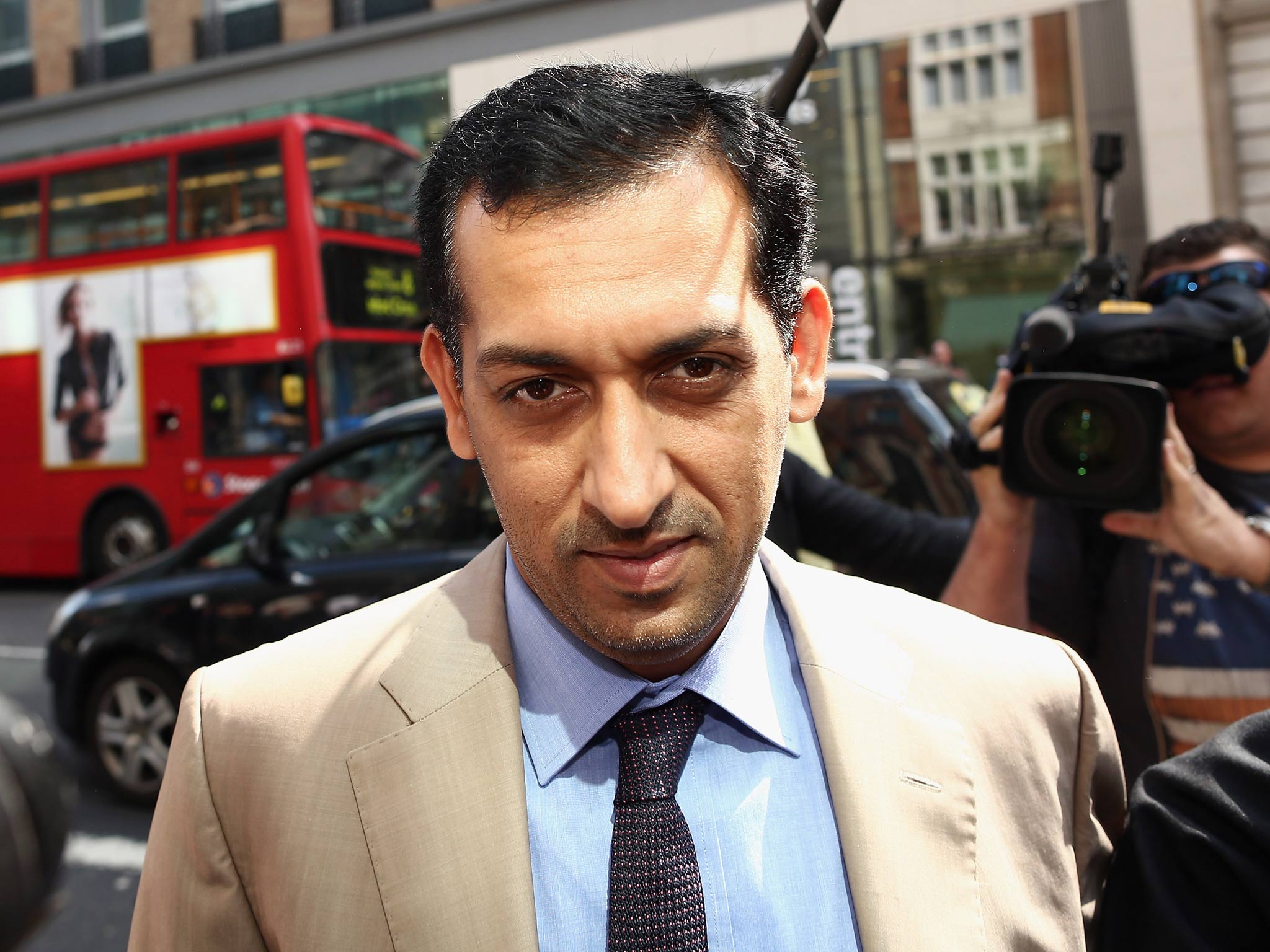 Horse trainer Mahmood Al Zarooni arrives to face a British Horseracing Authority disciplinary panel