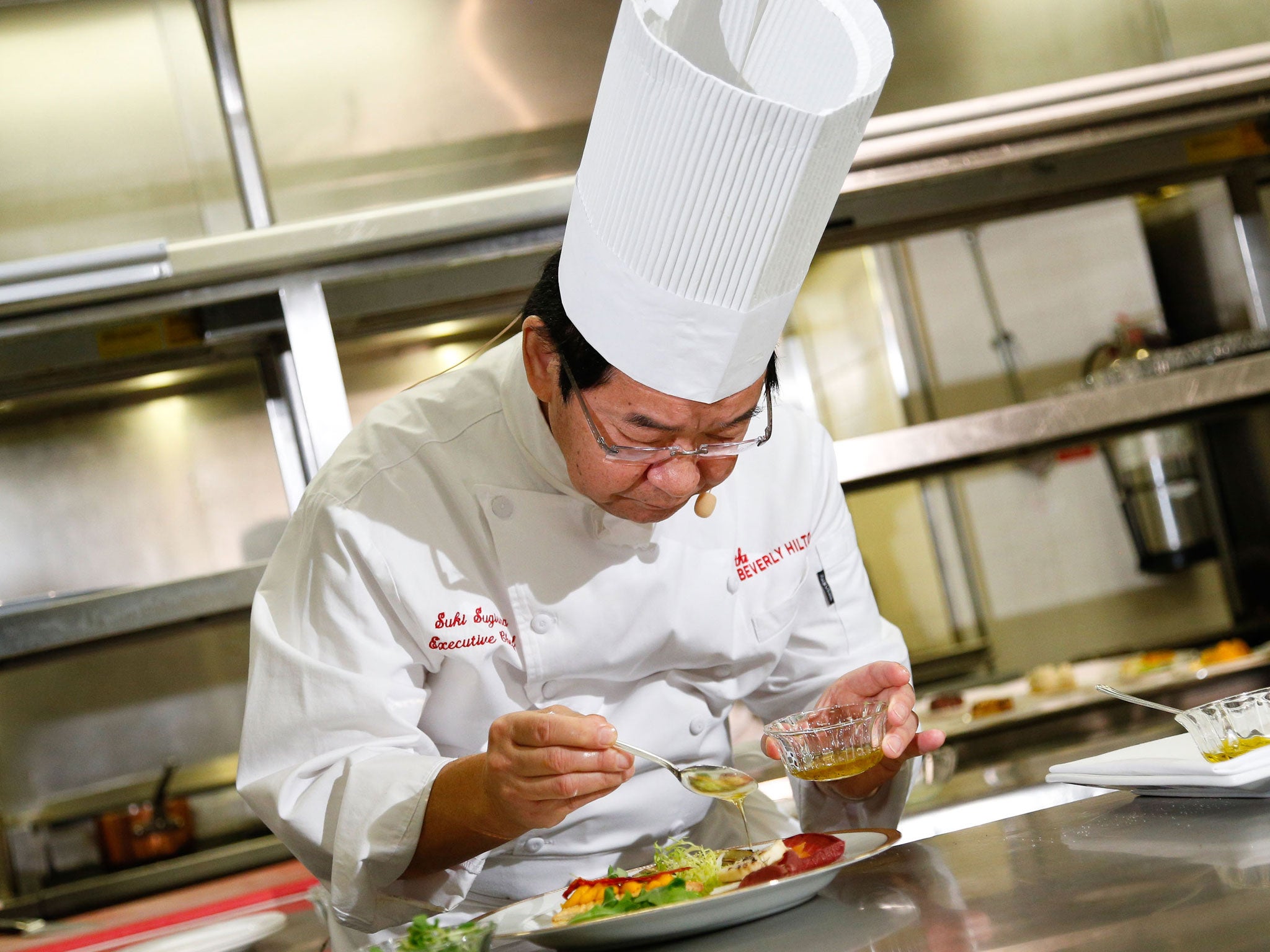 Executive chef Suki Sugiura performs a cooking demonstration to showcase the menu for the 2013 Golden Globe Awards at The Beverly Hilton Hotel on January 3, 2013 in Beverly Hills, California.