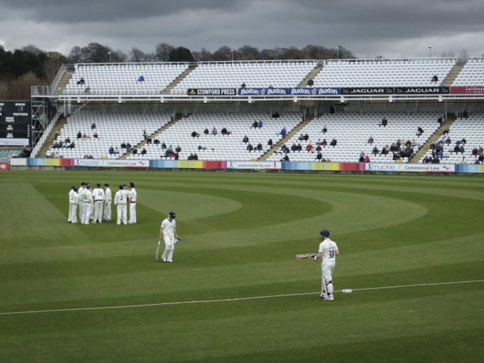 A sparse crowd braves the chill at the Emirates in Durhamon the opening day of the game against Yorkshire this week, where woollen blankets and furry friends remain de rigueur