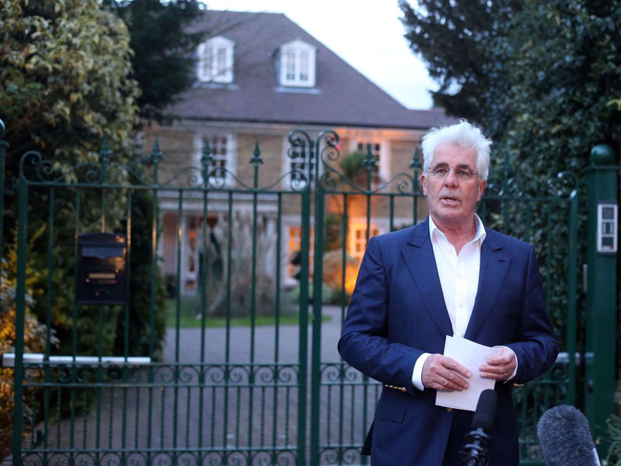 Max Clifford addresses reporters outside his home this evening