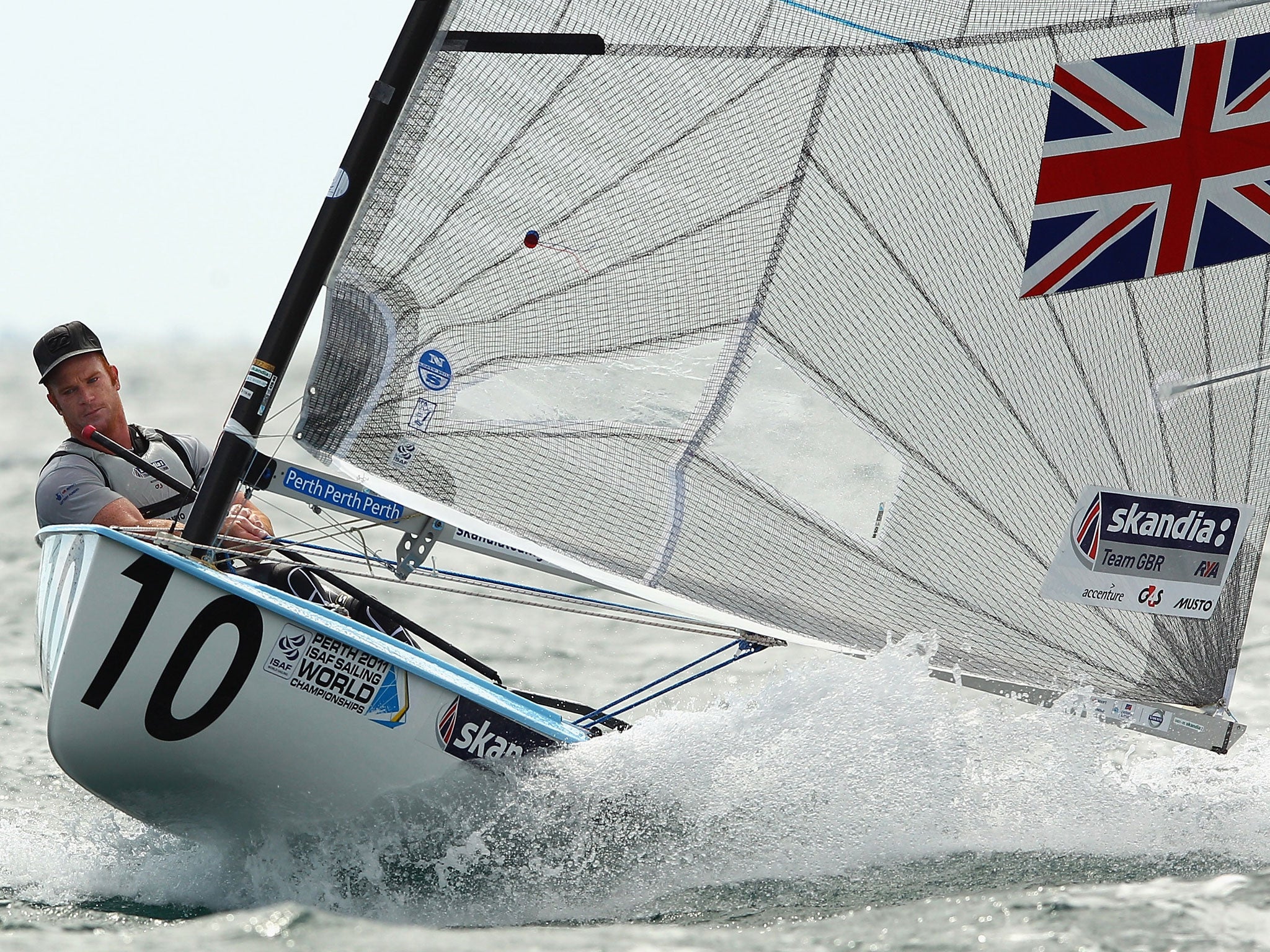 Andrew Mills of Great Britain competes in the Finn Gold Fleet on the Leighton Course during day seven of the 2011 ISAF Sailing World Championships