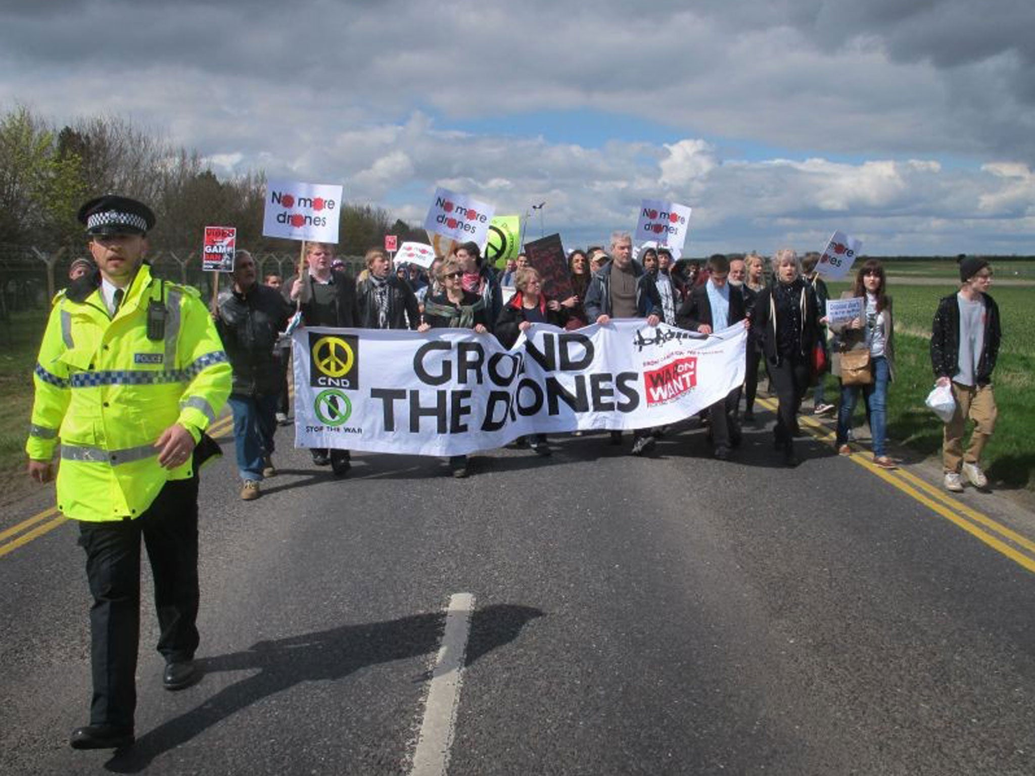Anti-drone campaigners marching on RAF Waddington