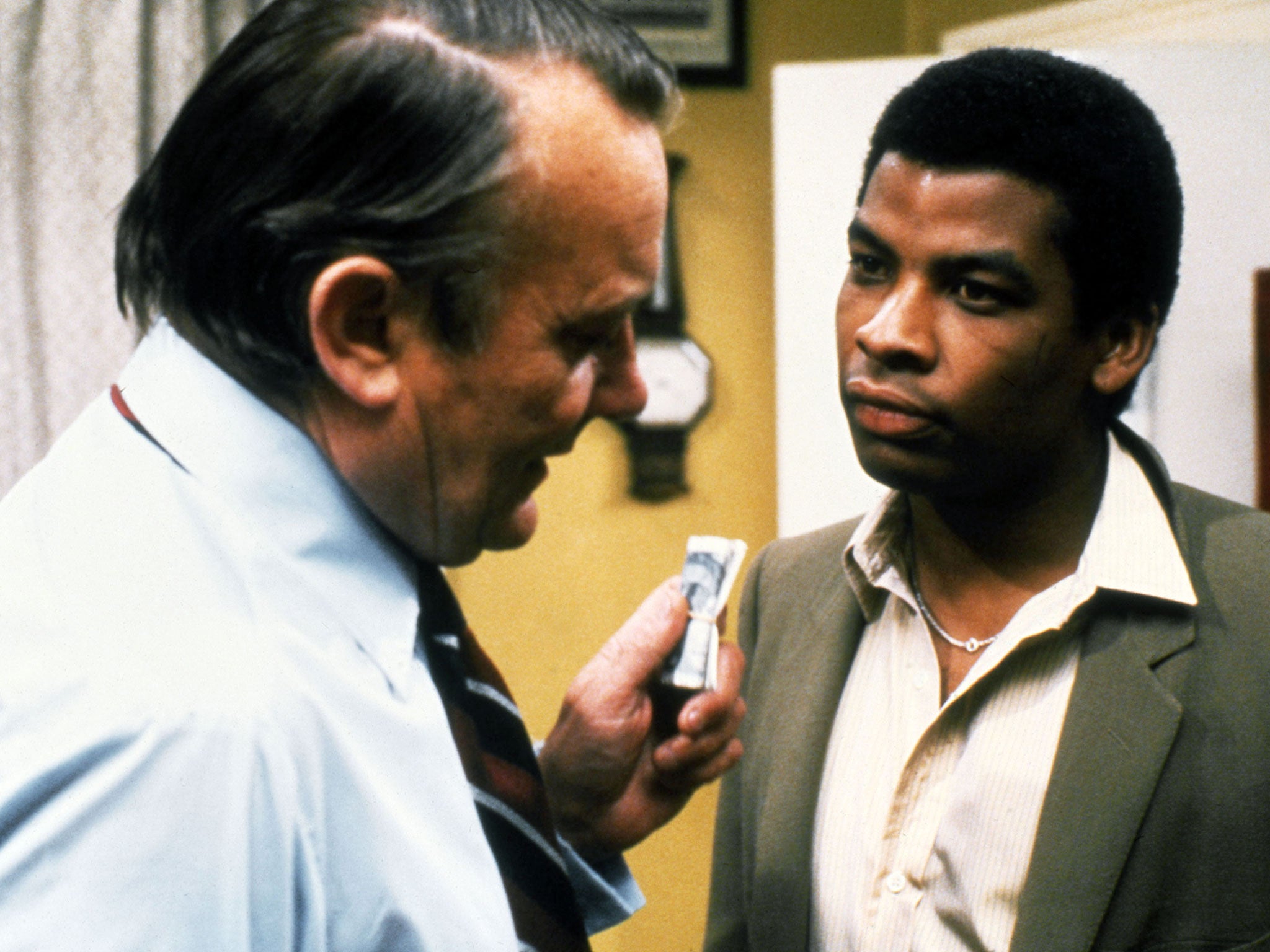 Rumbled: Don Warrington challenges con man Denholm Elliott in Rising Damp (1980)