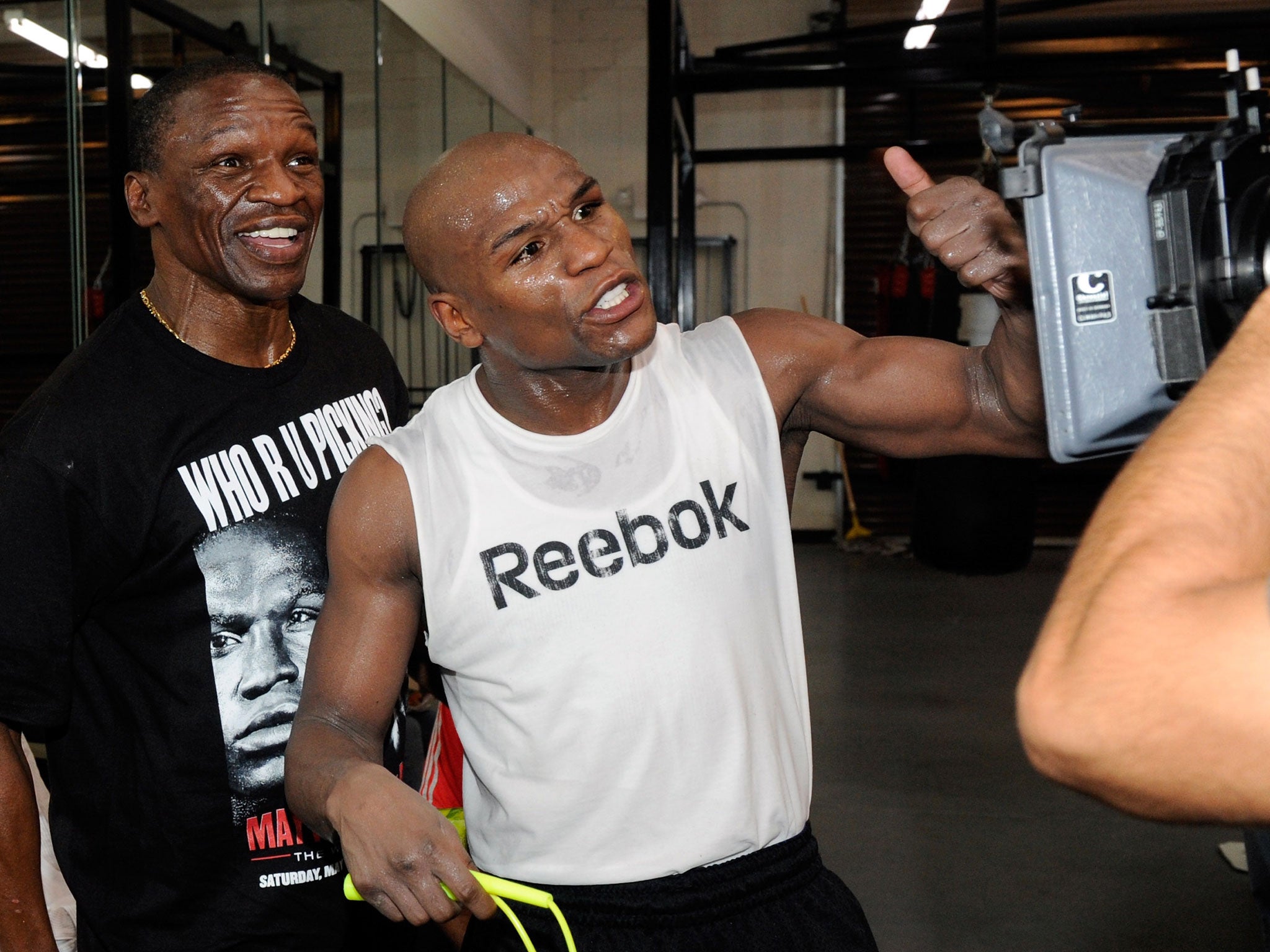 Parental guidance: Floyd Mayweather Jnr with his father Floyd Snr, who returns to his corner for the Guerrero fight