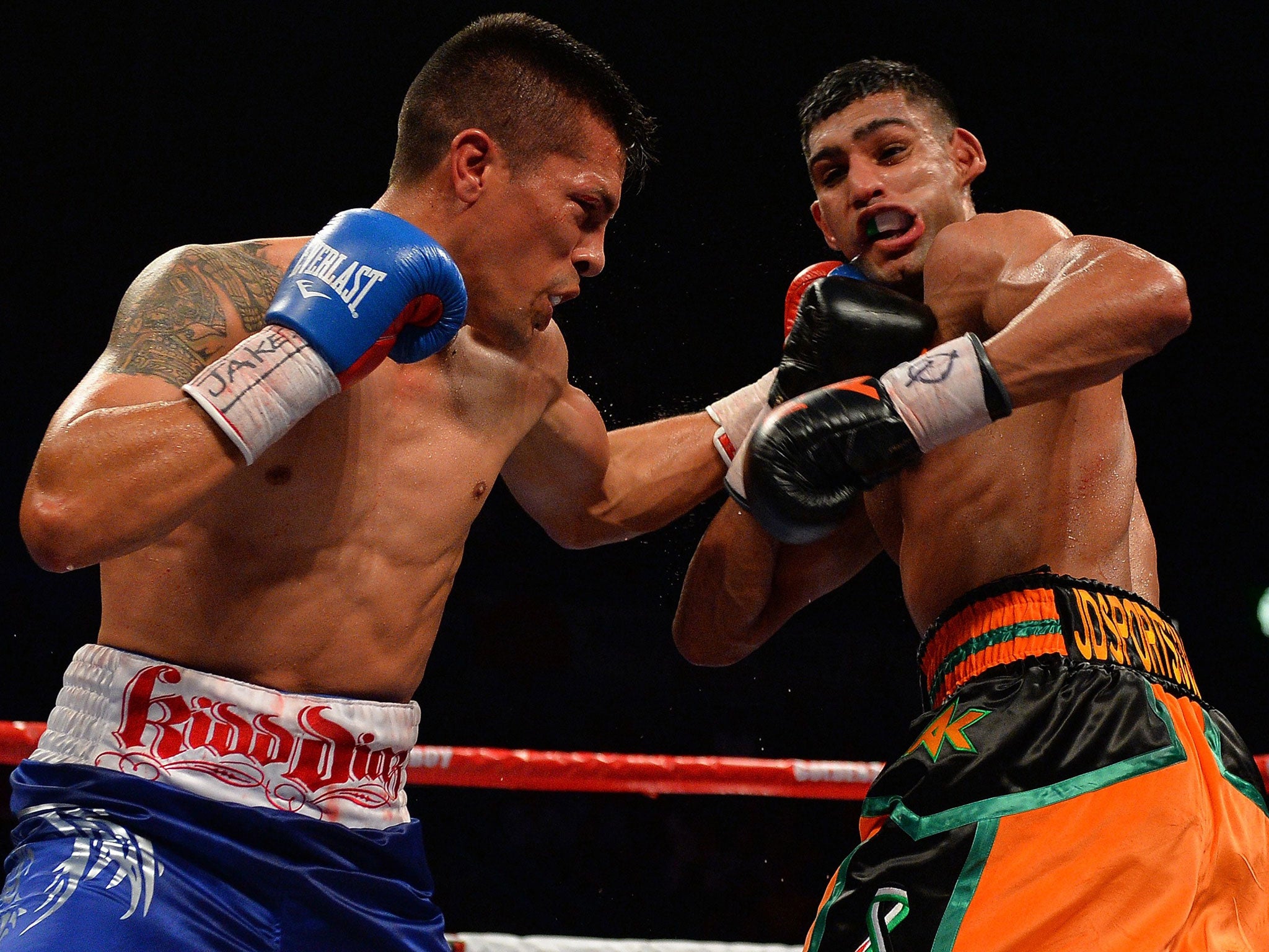 Amir Khan of Great Britain was fighting for survival with Julio Diaz - but eventually won the match