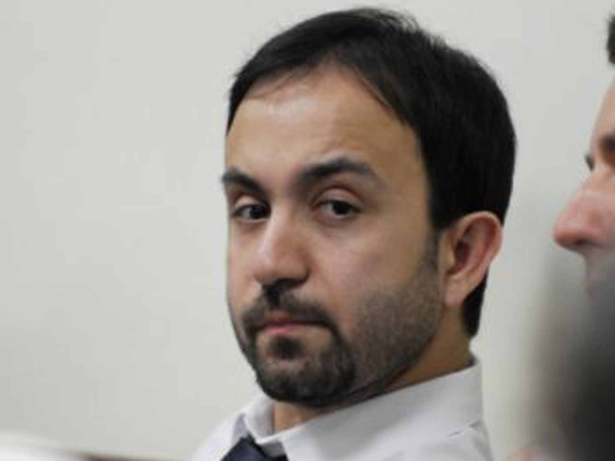 Arban Dervishi, the son of Pristina's prominent urologist Lutfi Dervishi attends the trial at the district court in Pristina for his trial on organ trafficking charges