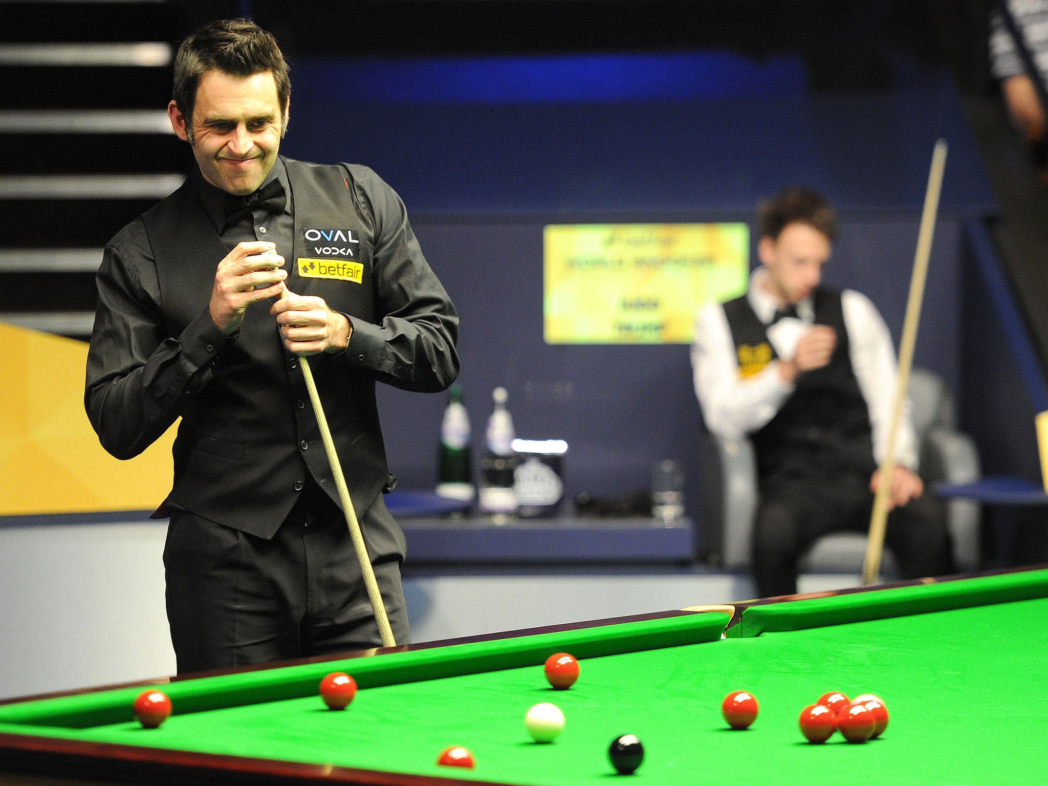 Ronnie O’Sullivan in action against Judd Trump