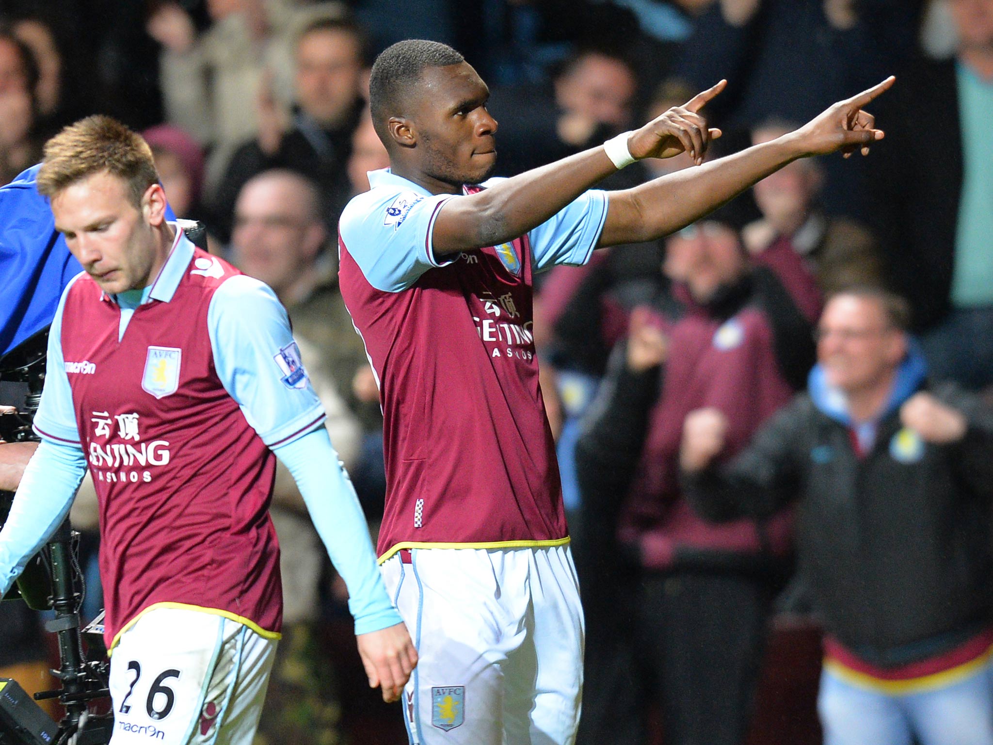 Christian Benteke celebrates scoring a hat-trick against Sunderland