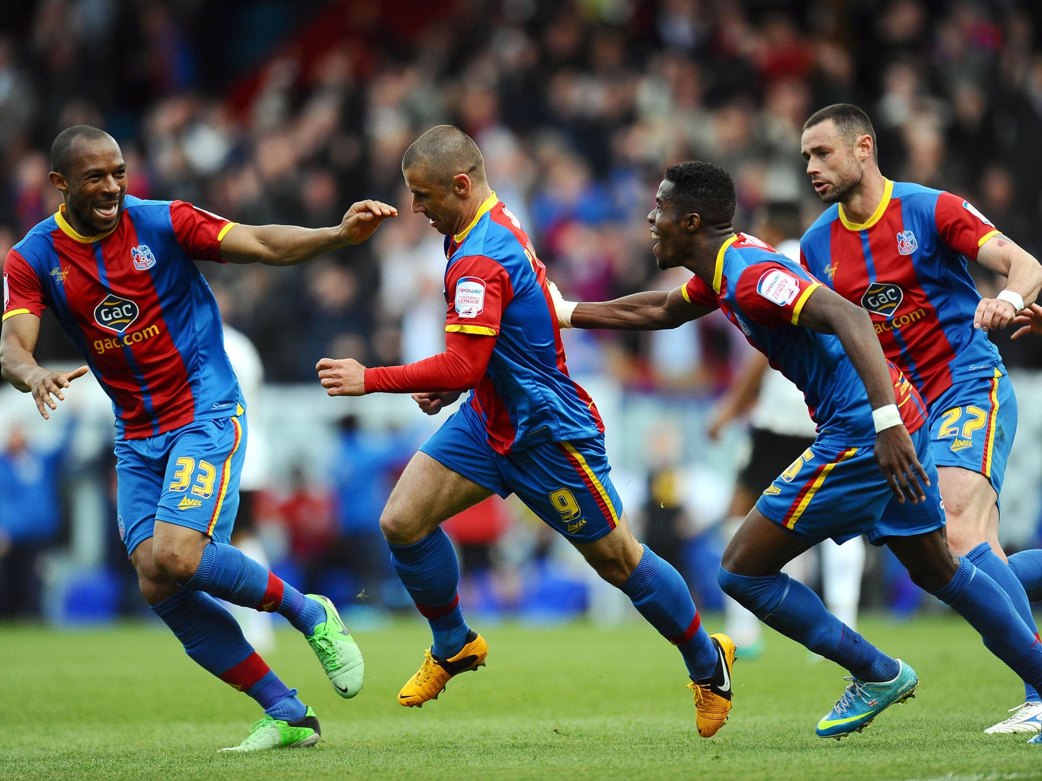 Kevin sent: Substitute Kevin Phlllips (second left) is congratulated by team-mates after putting Palace level at 2-2