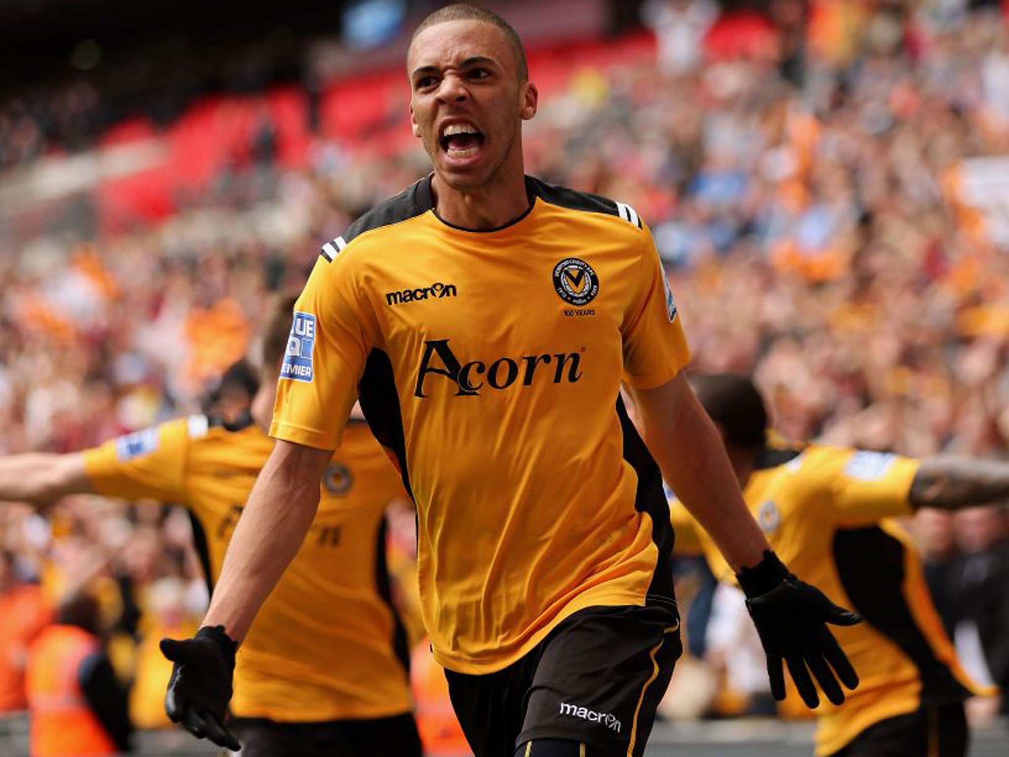 Christian Jolley of Newport County celebrates scoring a goal during the Blue Square Bet Premier Conference Play-off Final