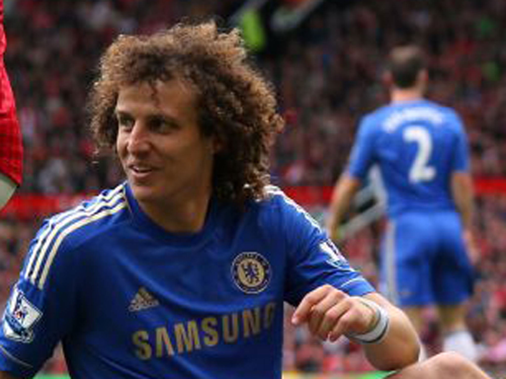 David Luiz smirks as his opponent Rafael da Silva is dismissed