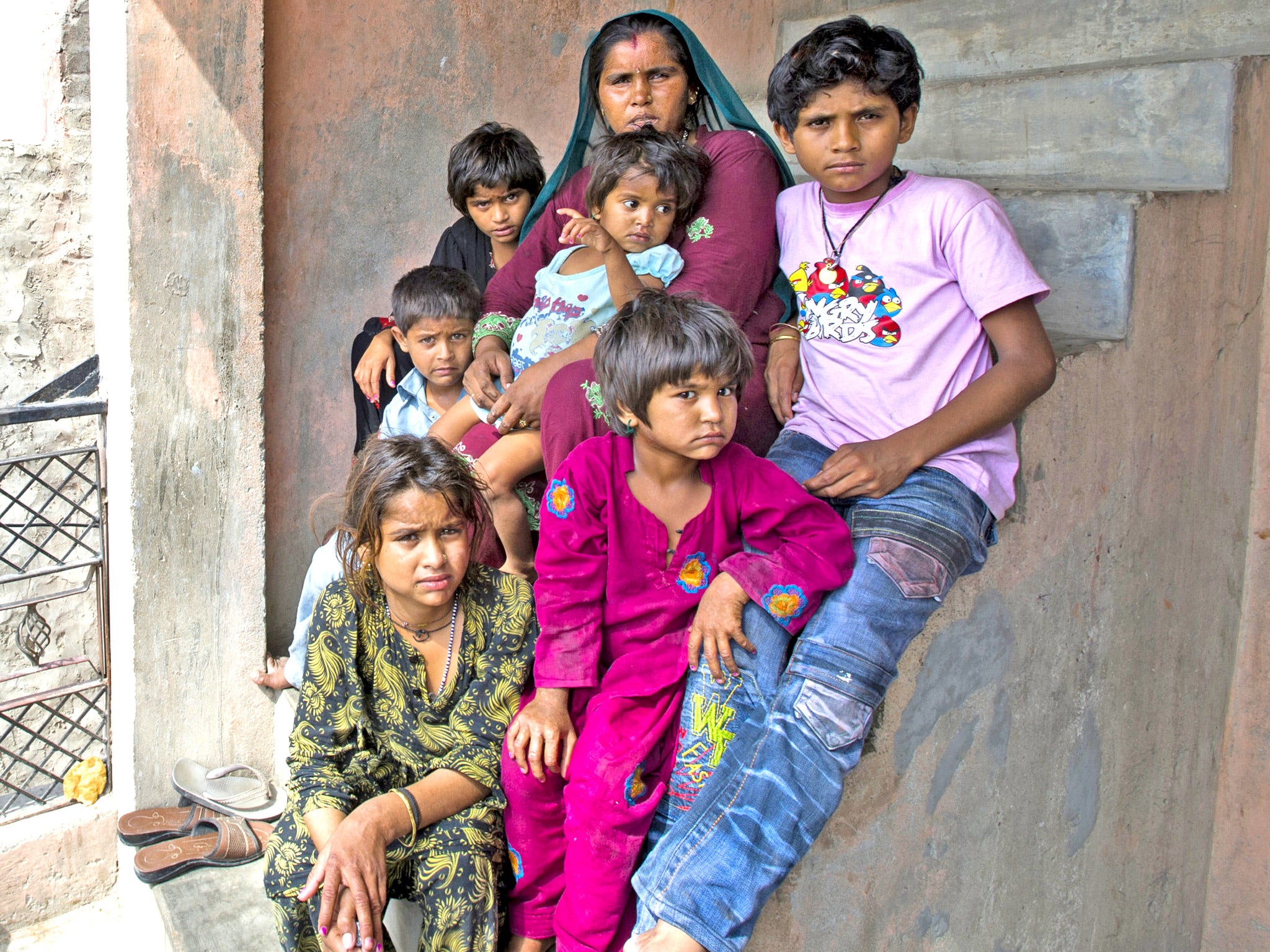 Bharti Sulanki with her children in Bharthal village, New Delhi