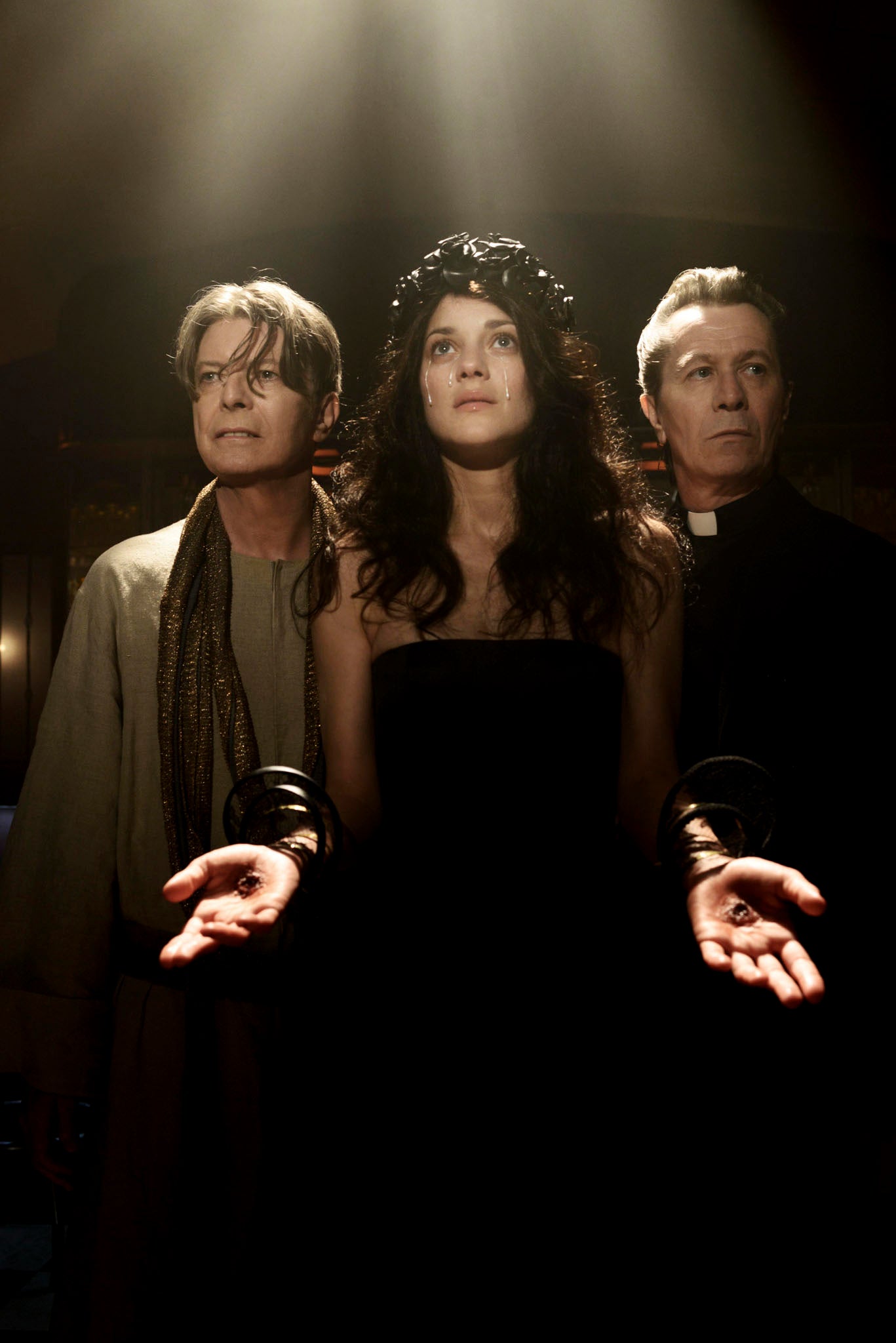 David Bowie, Marion Cotillard and Gary Oldman as they appear in a scene from the new Bowie video, directed  by Floria Sigismondi, for his latest song, The Next Day.