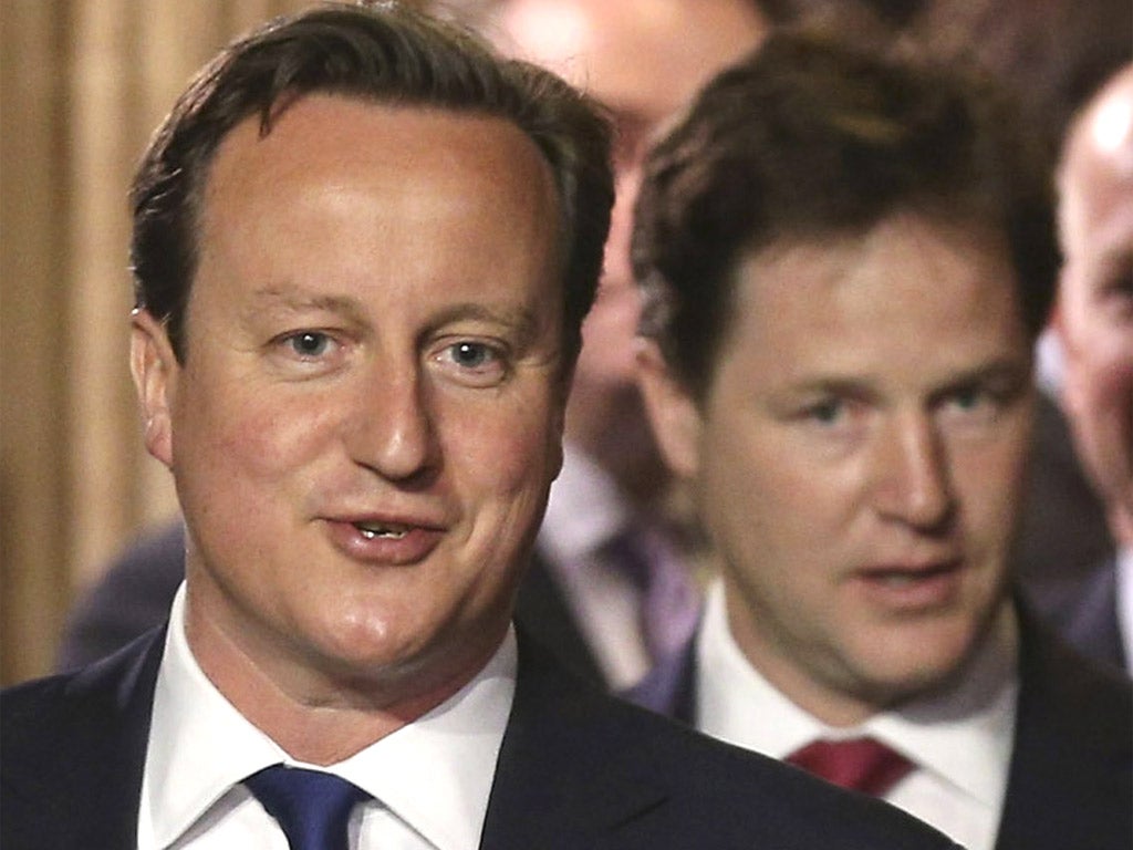 Prime Minister David Cameron and Deputy Prime Minister Nick Clegg arrive at the State Opening of Parliament at the House of Lords