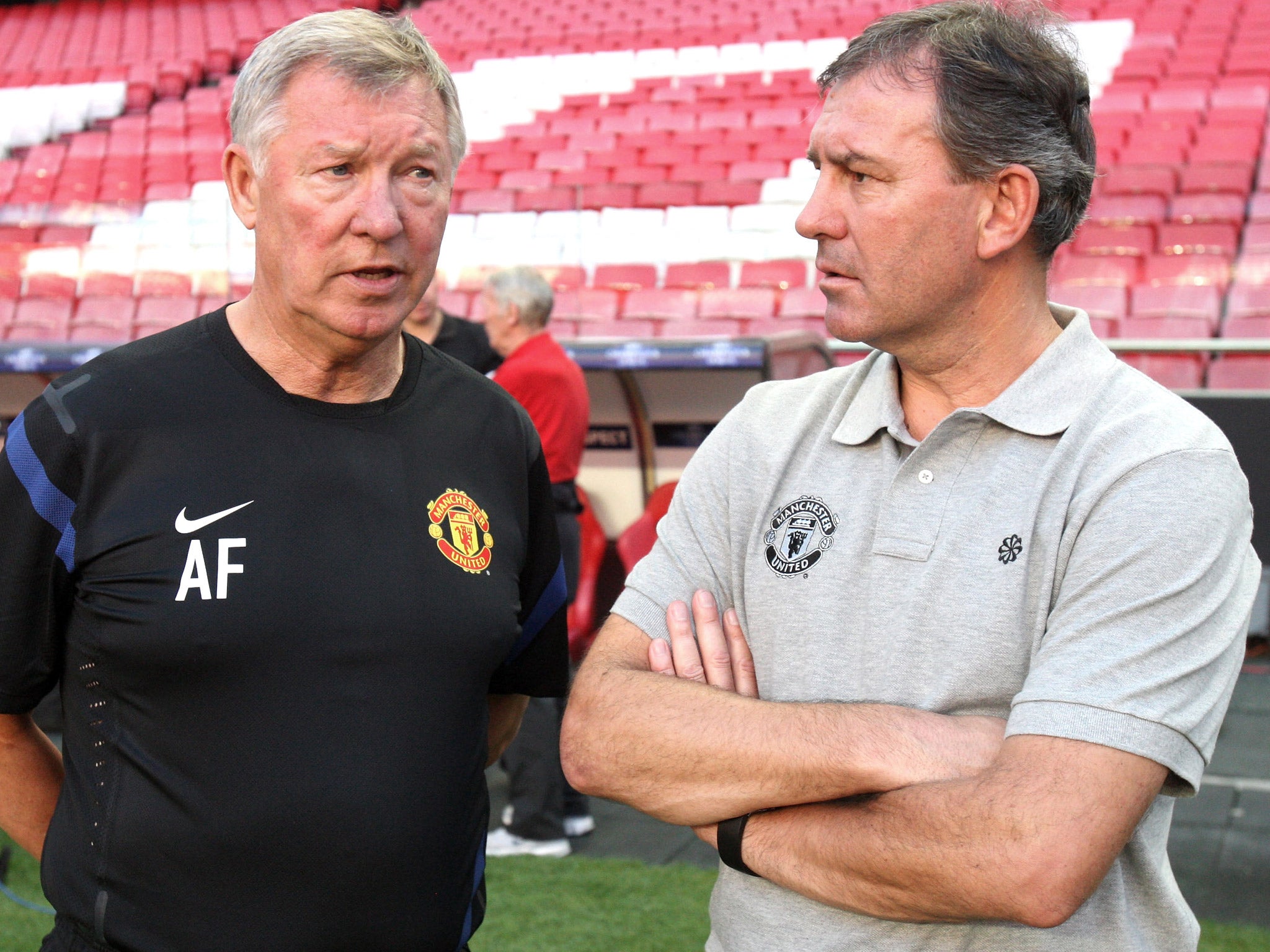 Sir Alex Ferguson with former club captain Bryan Robson