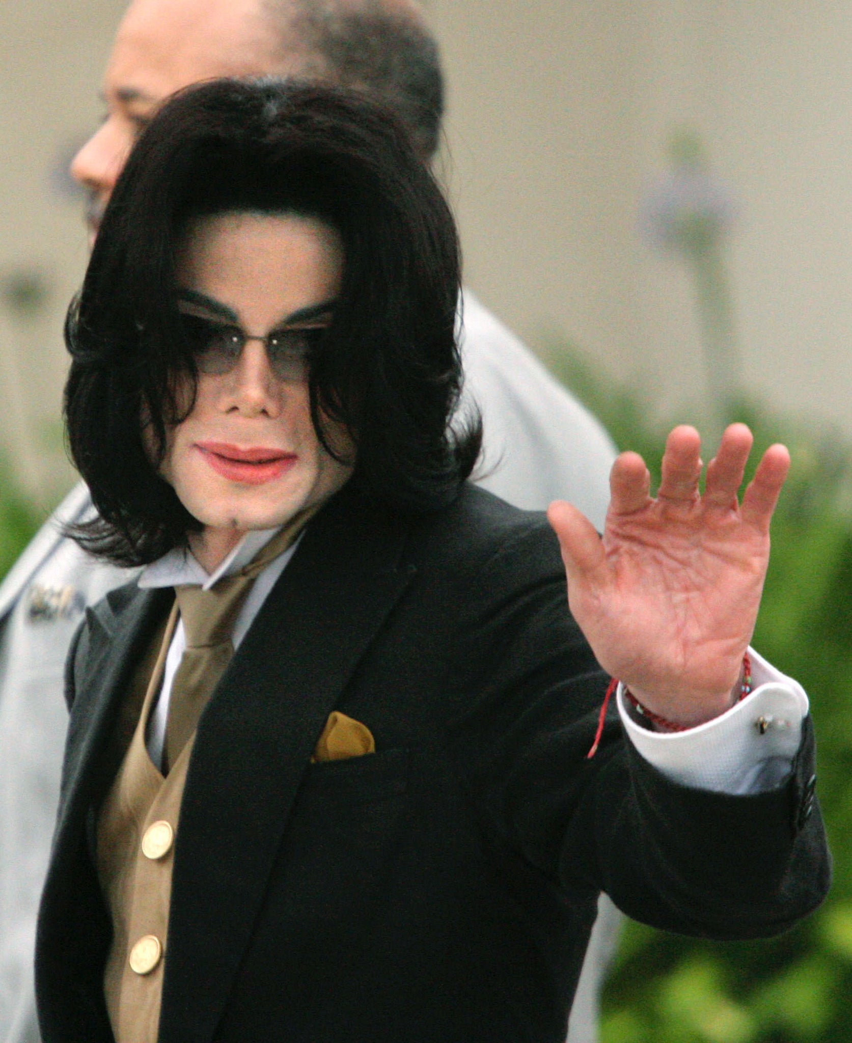 Singer Michael Jackson pictured outside the Santa Barbara County Courthouse for proceedings in his child molestation trial in 2005 in Santa Maria, California. Wade Robson, who testified in his defence at the trial, has now accused the singer of sexual abu