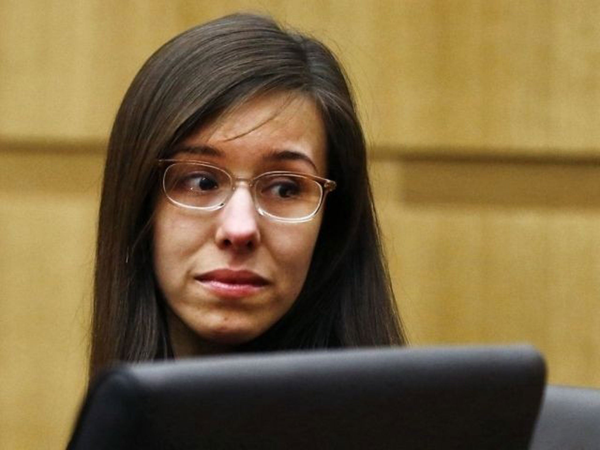 Jodi Arias reacts as a guilty verdict is read in her first-degree murder trial in Phoenix, Arizona