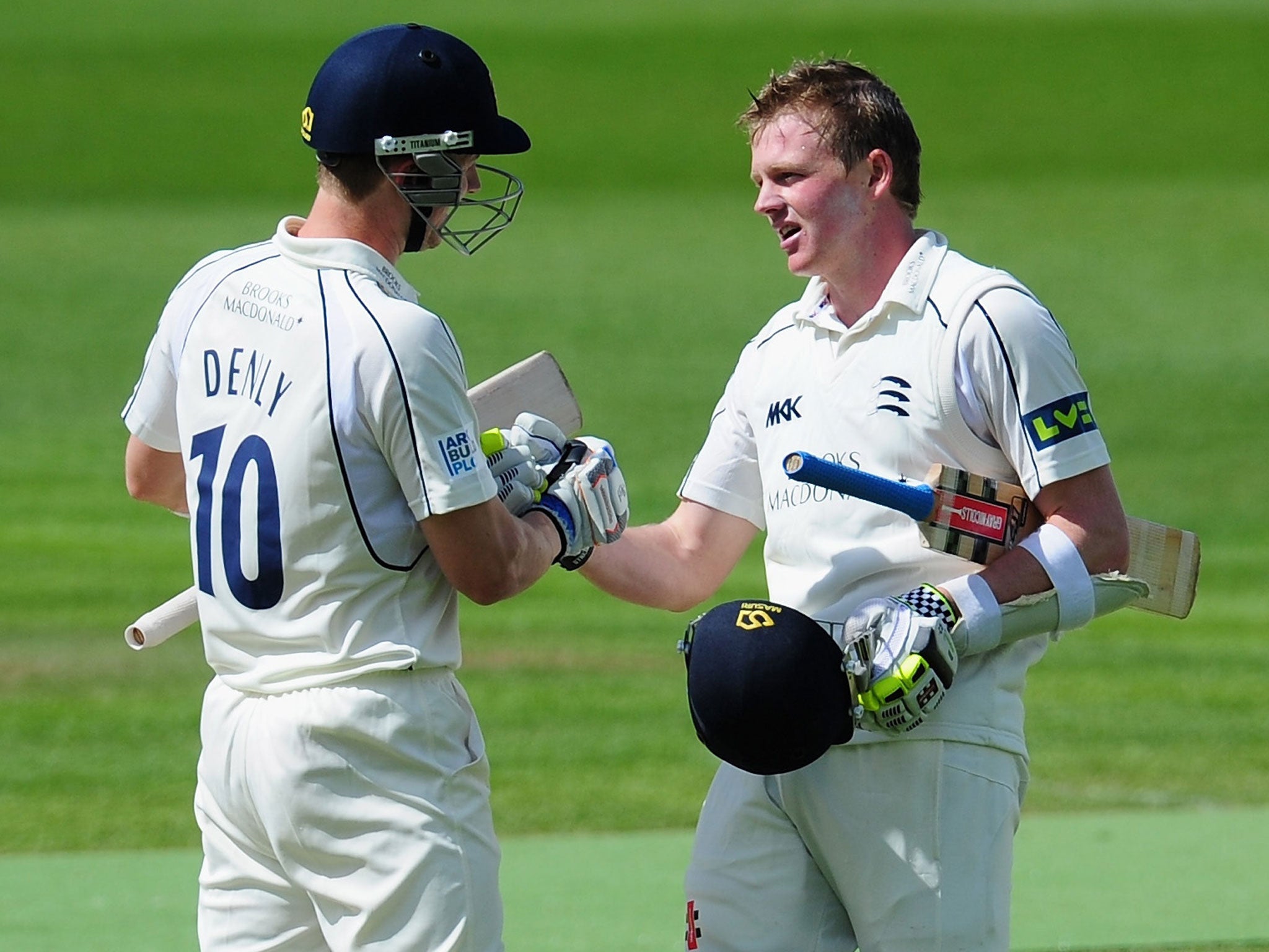 Sam Robson (right) celebrates his century with Joe Denly