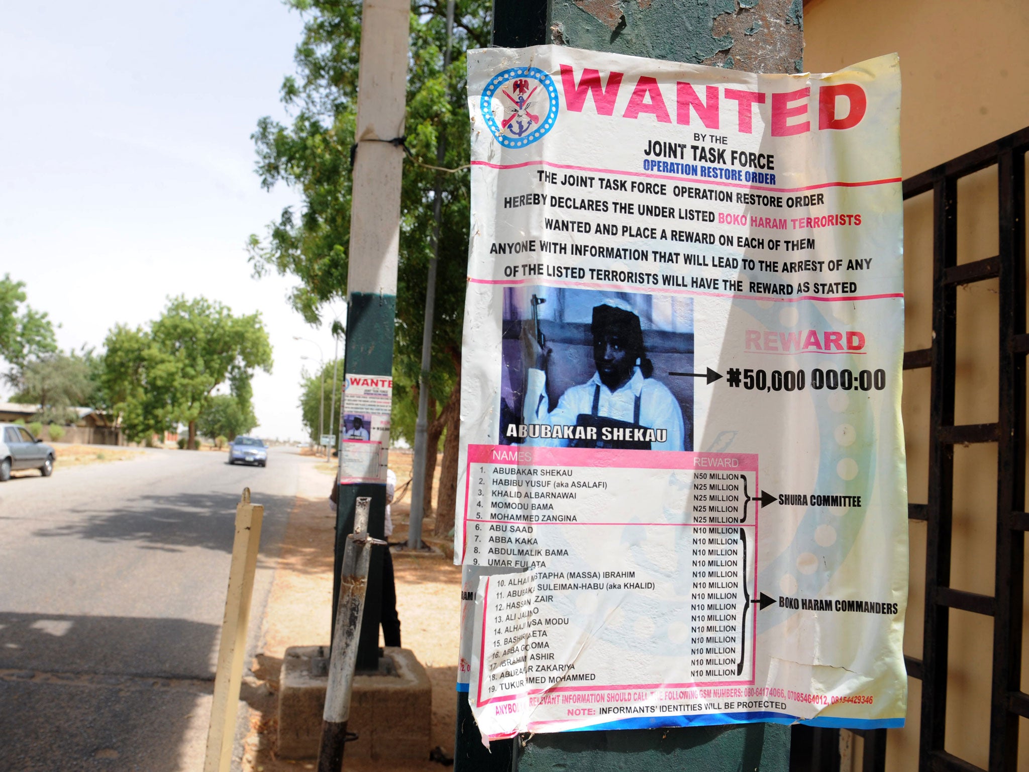 On the run: A poster offers a reward for the capture of Boko Haram’s Abubakar Shekau